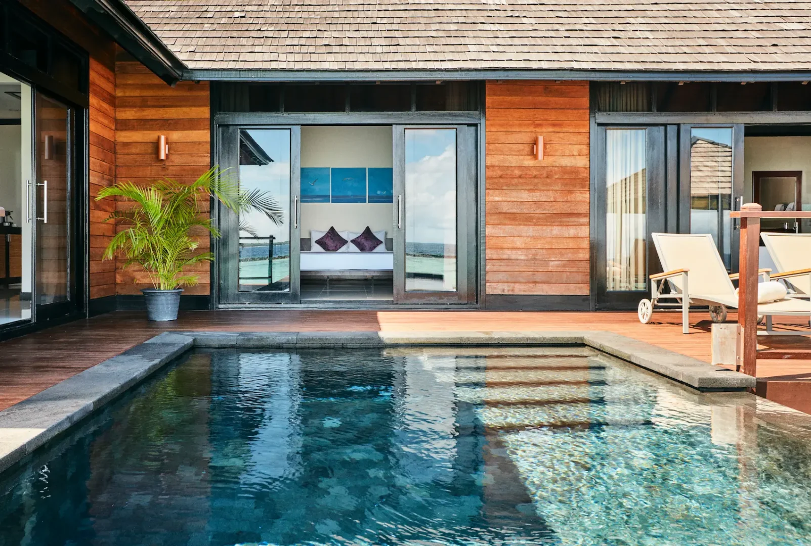 luxury infinity water villa pool at sun siyam iru fushi maldives overwater accommodation