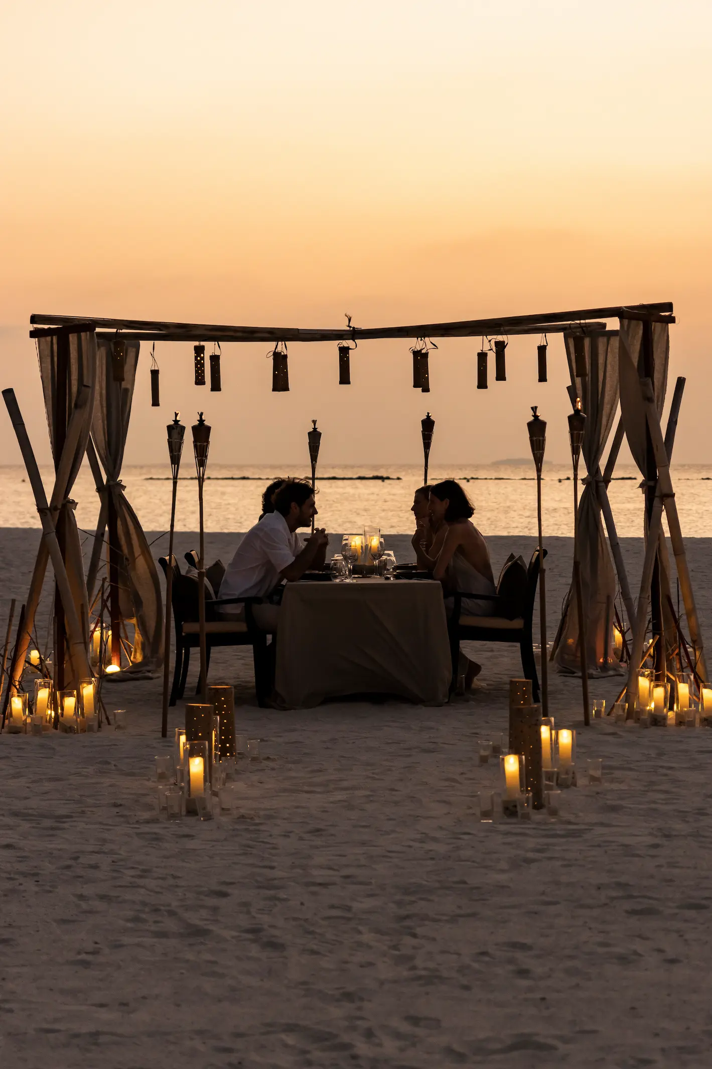 luxury moonlight dinner at sun siyam iru fushi maldives private romantic island dining experience