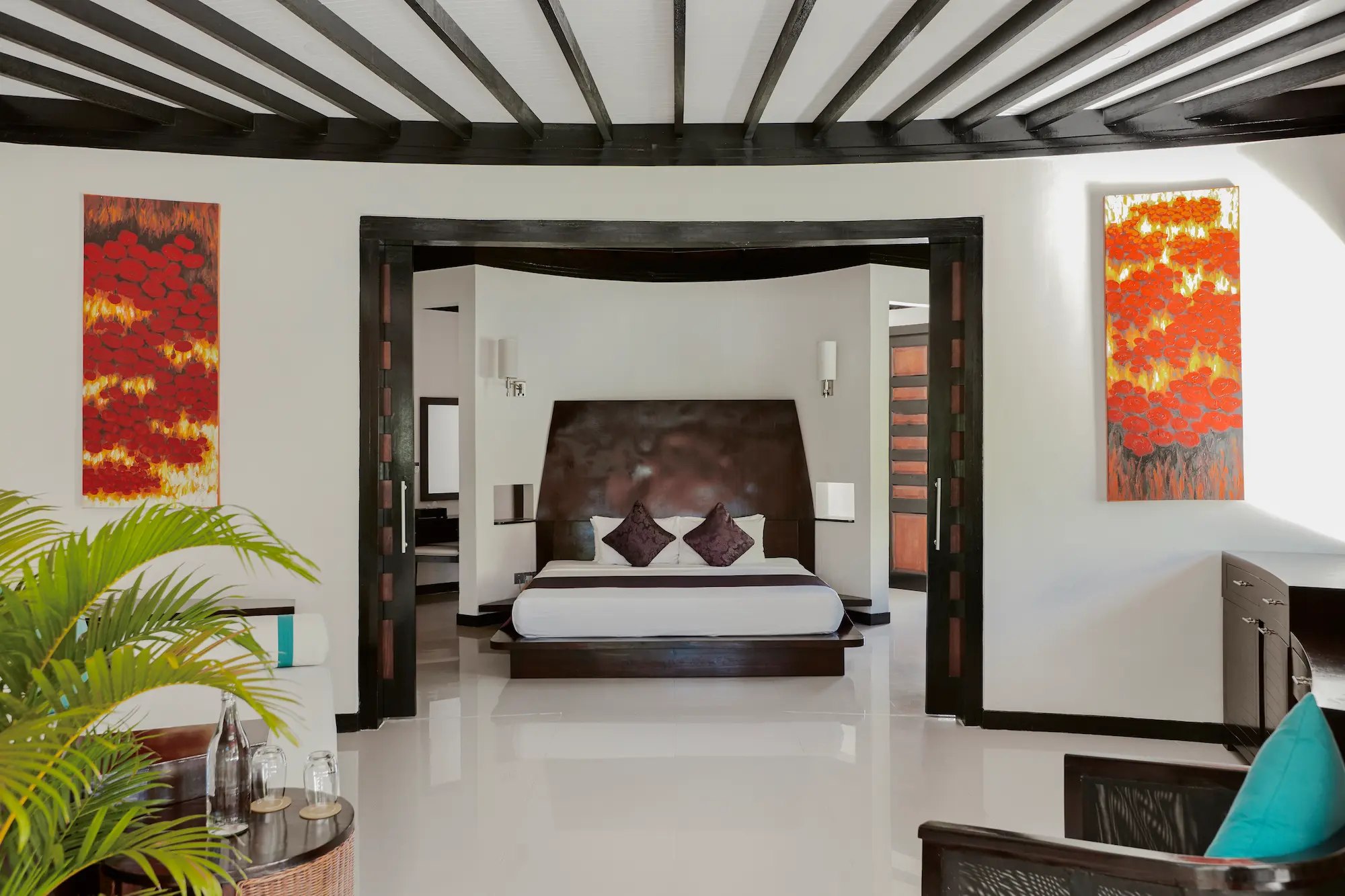 luxury pool beach villa bedroom at sun siyam iru fushi maldives private beachfront accommodation