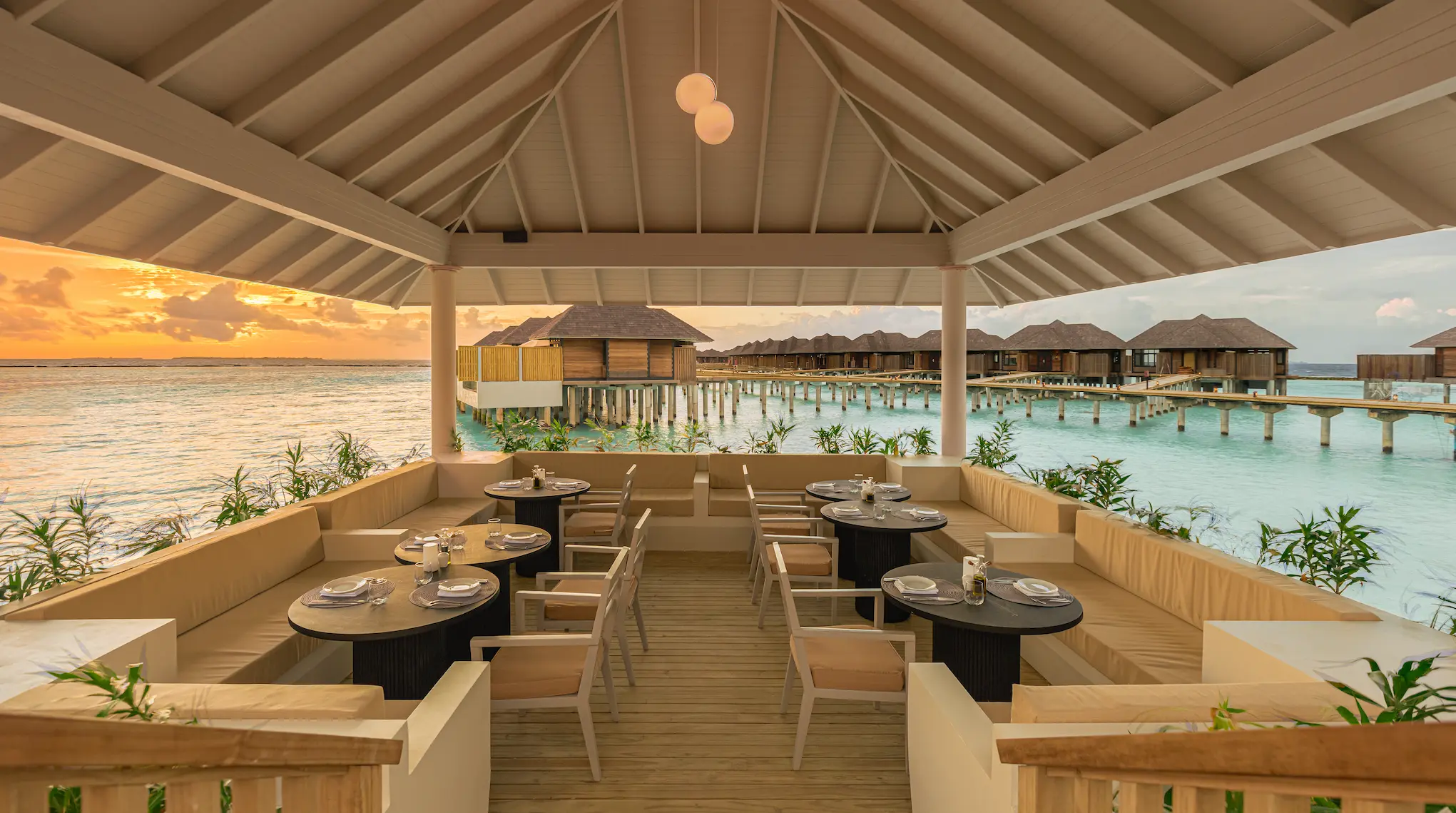 luxury trio outdoor wing at sun siyam iru fushi maldives open air island dining experience