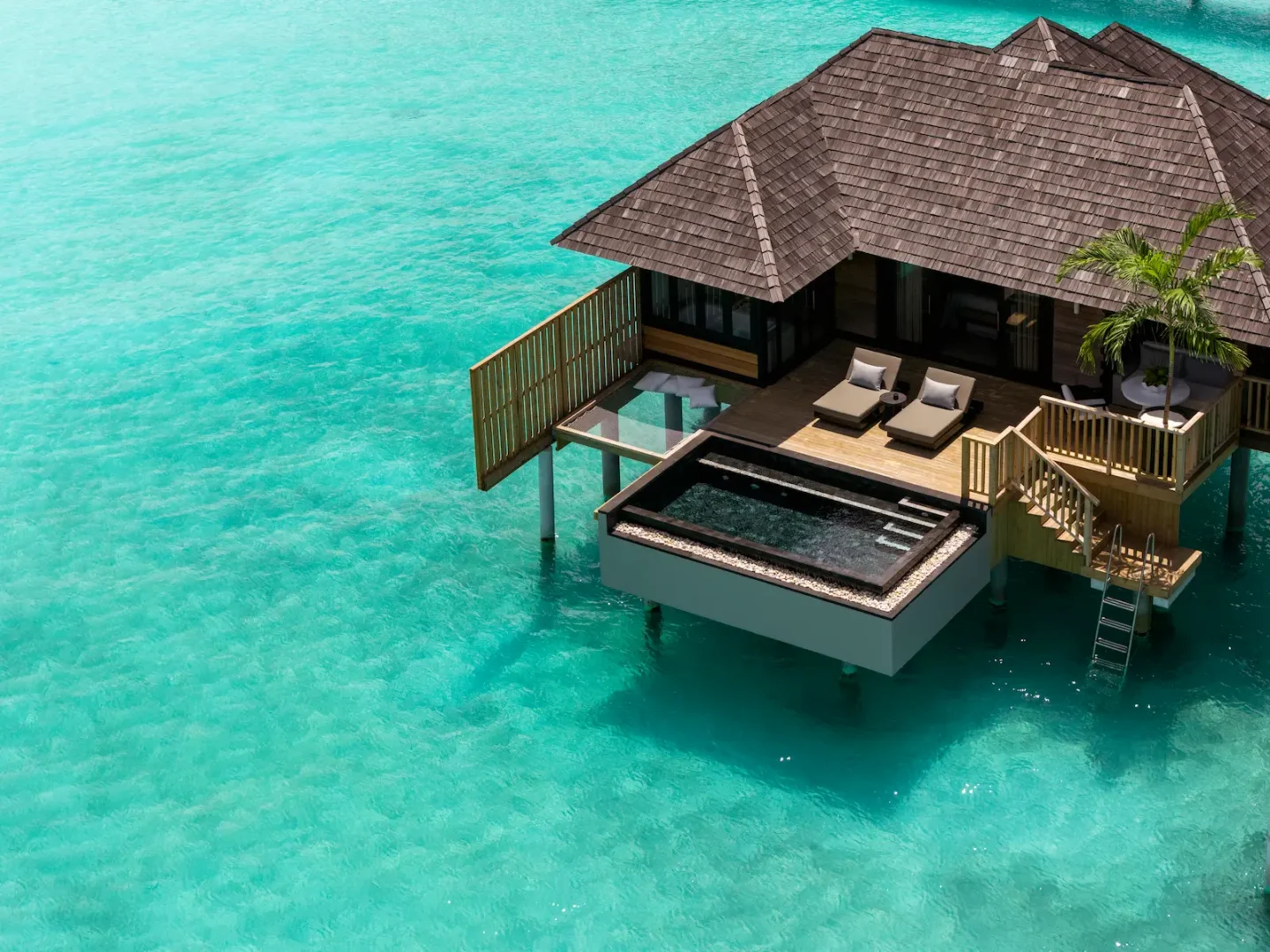 luxury water villa with pool exterior at sun siyam iru fushi maldives overwater accommodation