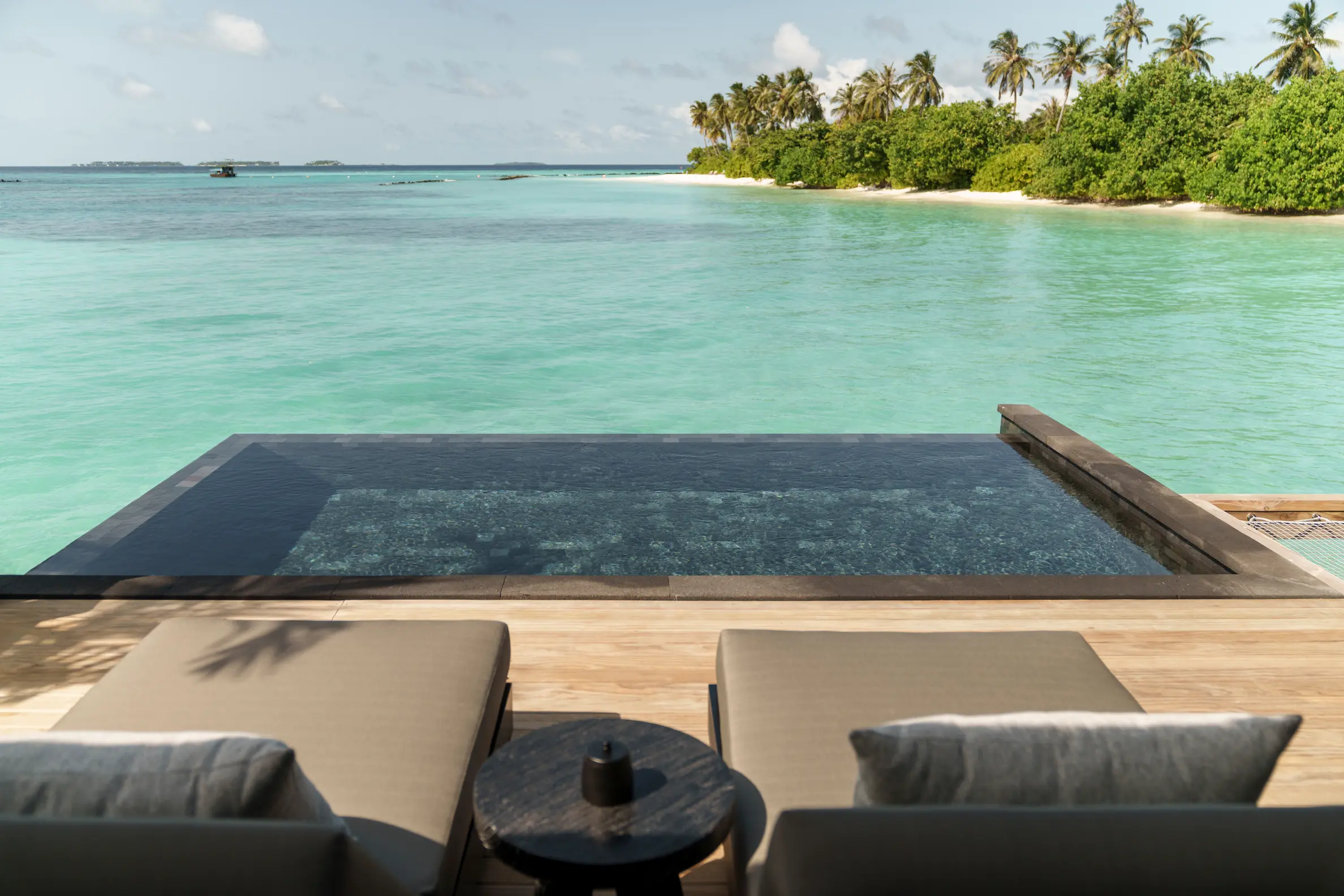luxury water villa with pool terrace at sun siyam iru fushi maldives overwater accommodation