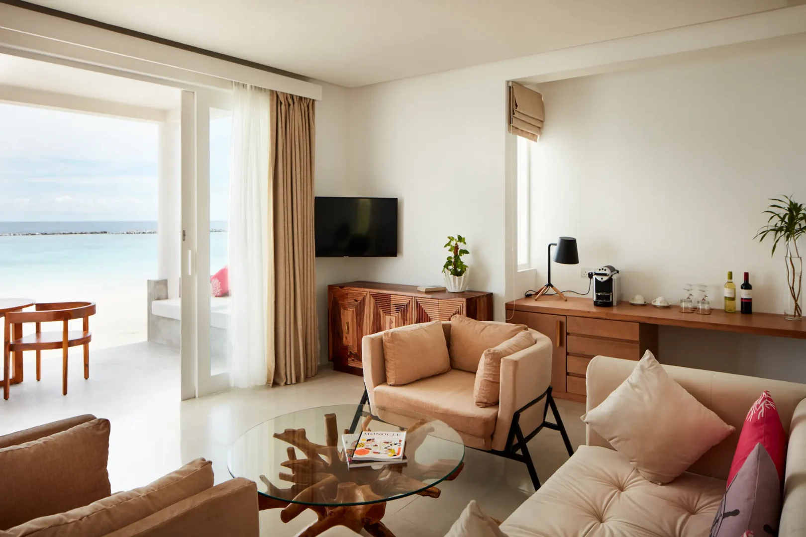 sun siyam iru veli beach residence with pool living area maldives