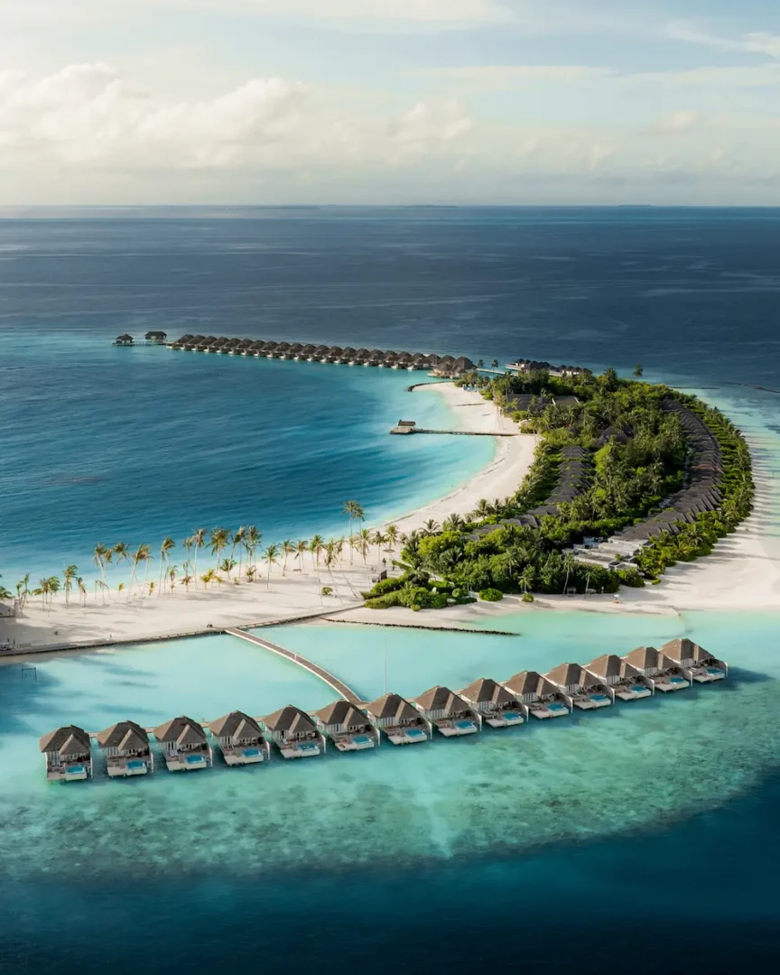 sun siyam iru veli dolphin ocean villa with pool overwater aerial maldives