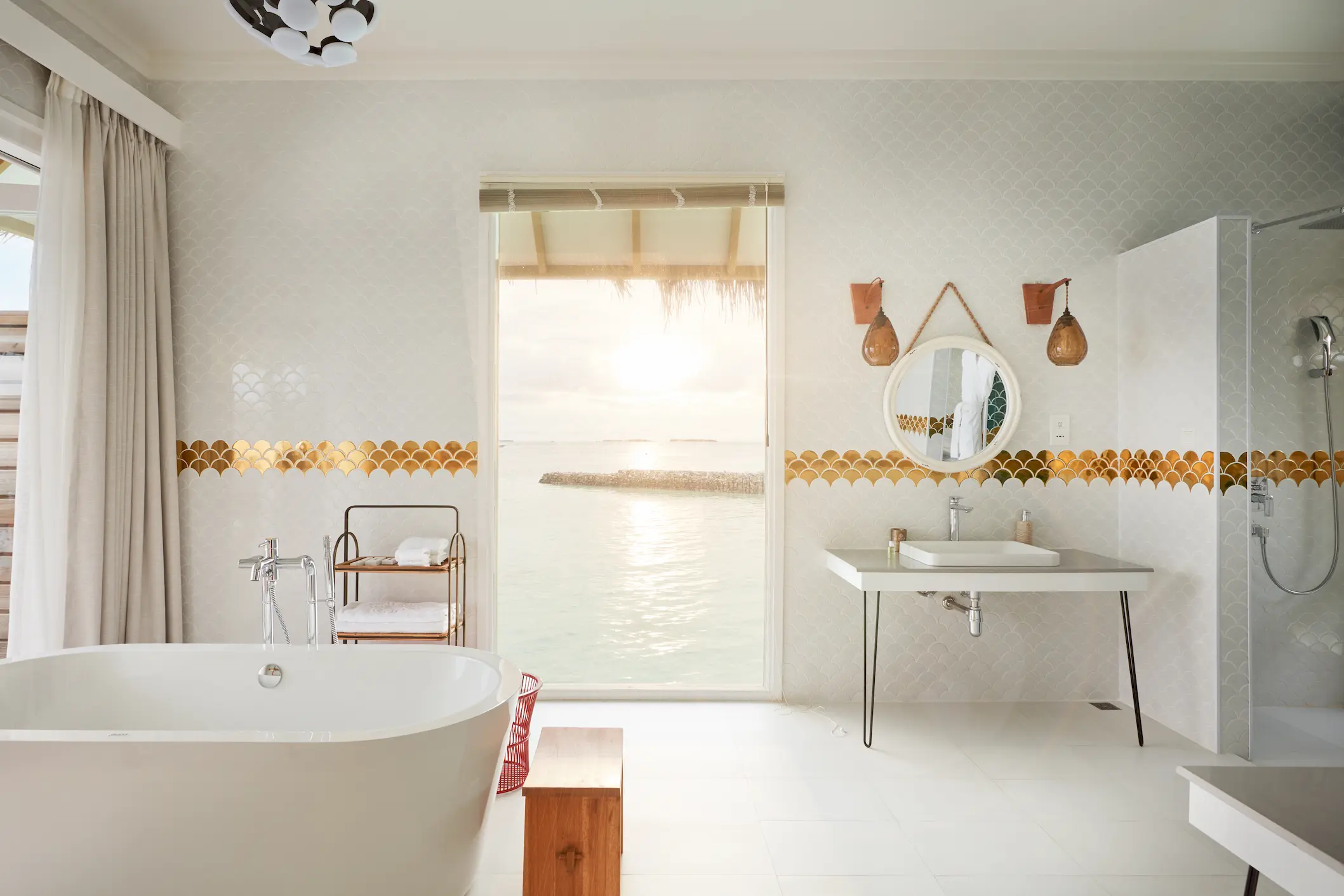 sun siyam iru veli dolphin ocean villa with pool overwater bathroom maldives