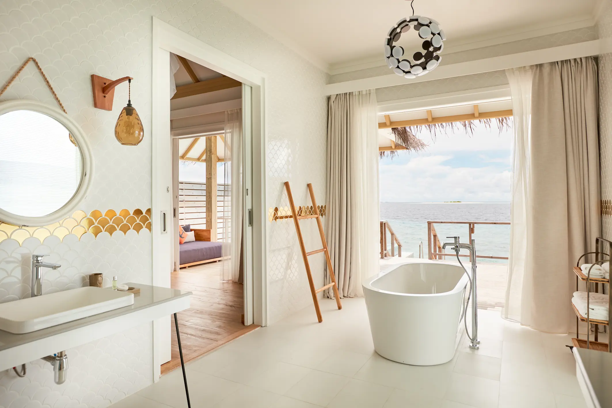 sun siyam iru veli dolphin ocean villa with pool overwater bathtub maldives