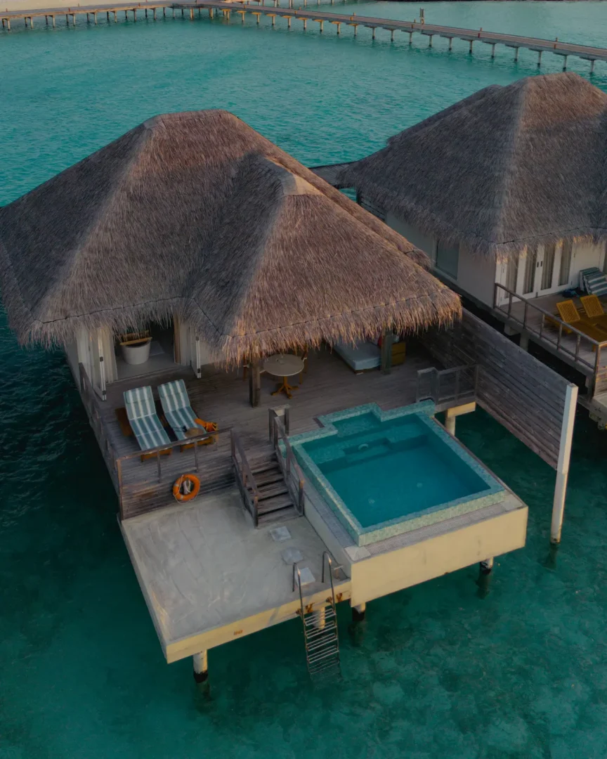 sun siyam iru veli dolphin ocean villa with pool overwater exterior maldives