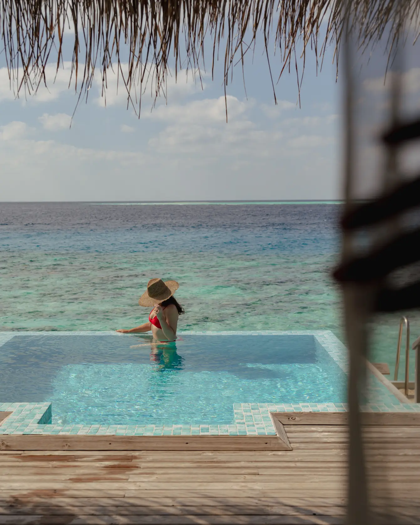 sun siyam iru veli dolphin ocean villa with pool overwater lifestyle maldives