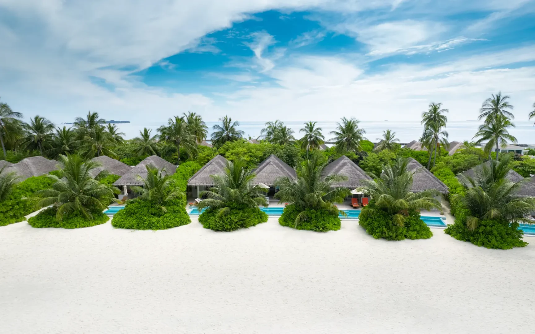 sun siyam iru veli maldives beach villa with pool aerial view highlighting private layout beachfront position and tropical island setting