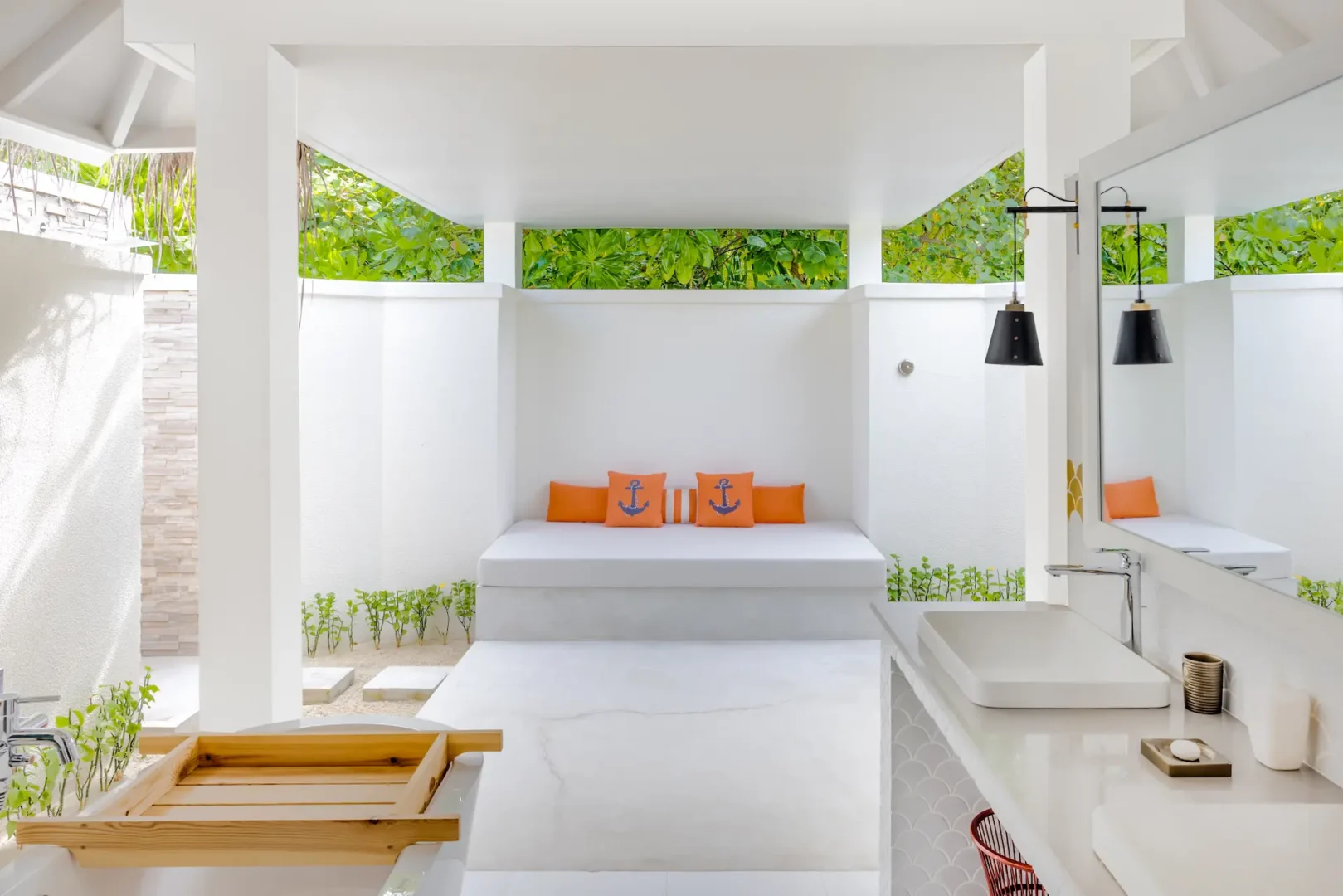 sun siyam iru veli maldives beach villa with pool bathroom featuring natural stone finishes open air design and serene island style