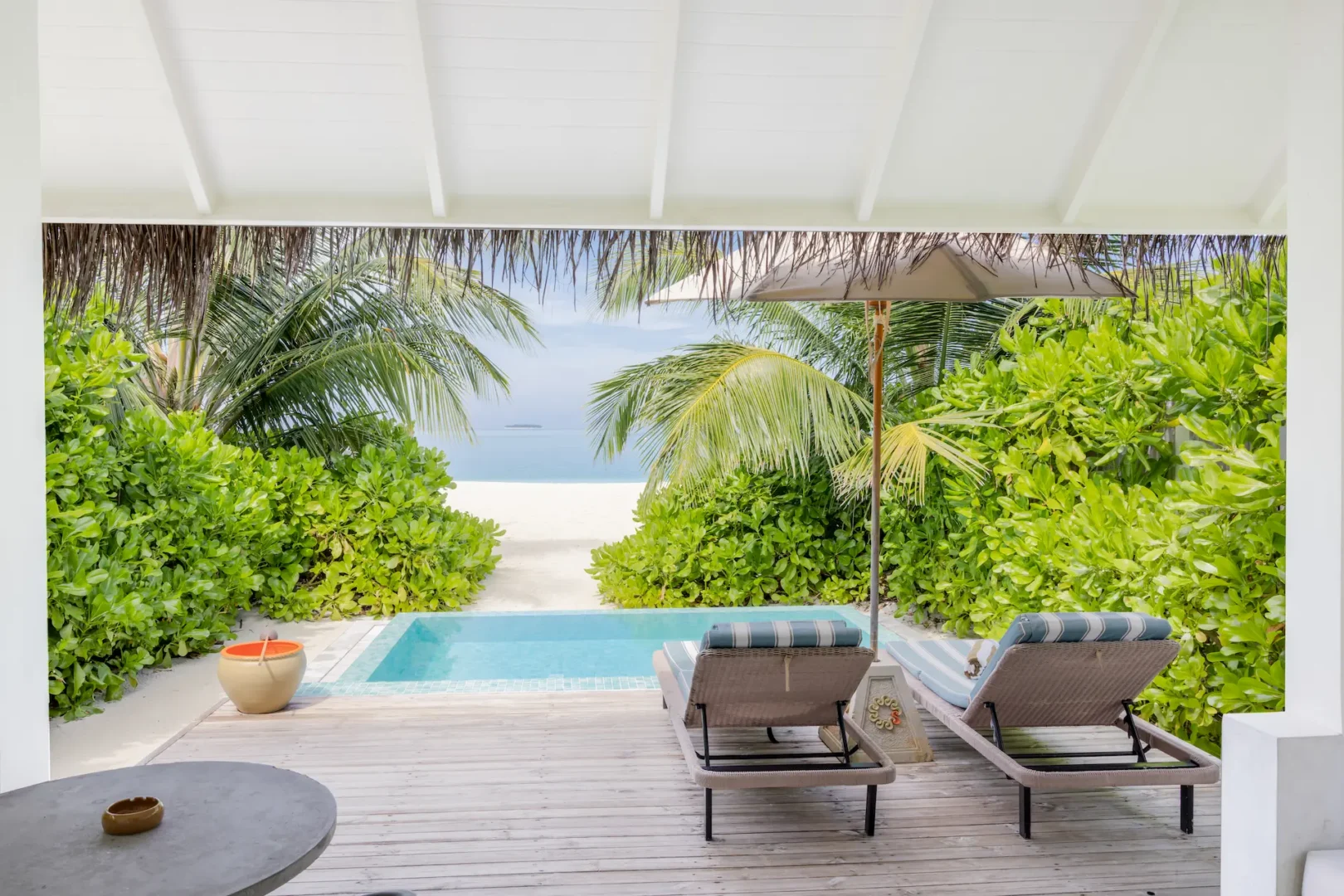 sun siyam iru veli maldives beach villa with pool offering direct beach access from private terrace and tropical surroundings