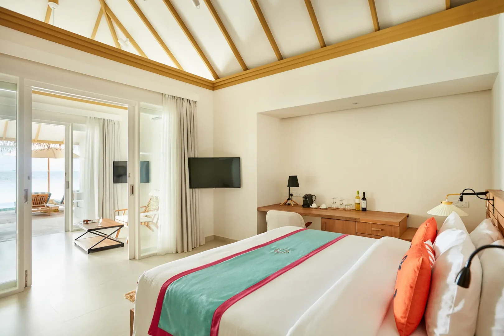 sun siyam iru veli maldives family beach villa with pool interior featuring spacious bedroom warm natural interiors and family friendly island living