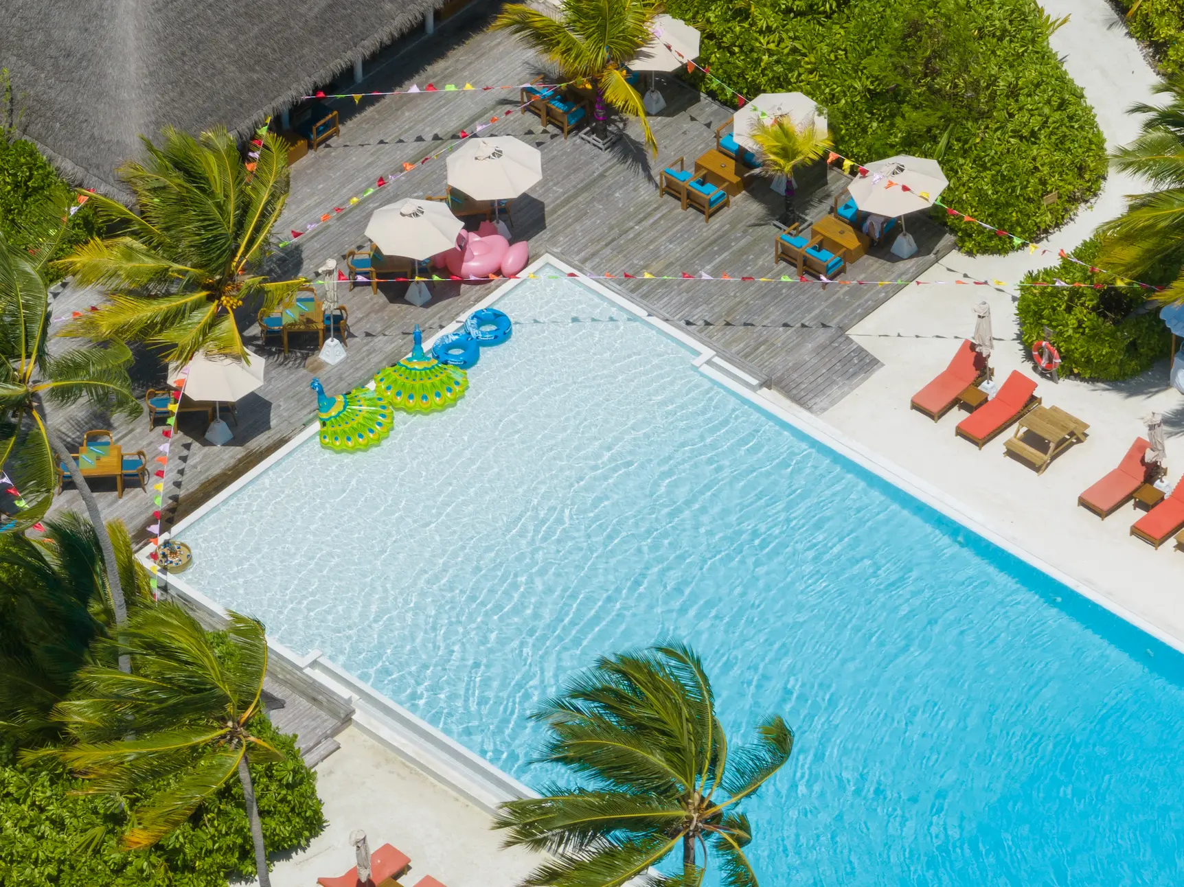 sun siyam iru veli maldives fresh water showcasing a relaxed open air dining ambience with ocean views