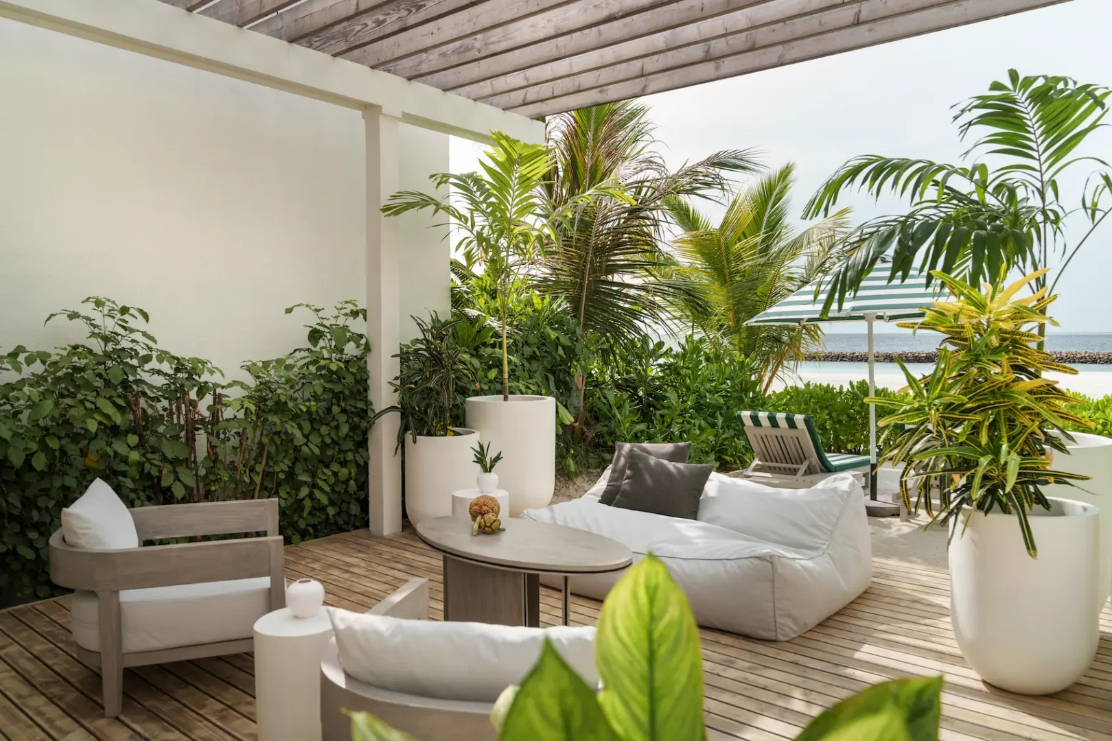 sun siyam iru veli maldives grand beach villa with pool terrace featuring spacious outdoor deck private pool and relaxed island atmosphere