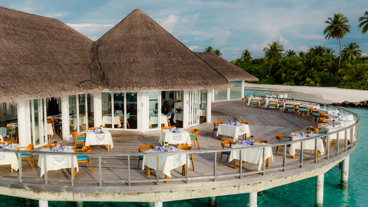 sun siyam iru veli maldives roma showcasing an elegant italian dining ambience with refined interiors and relaxed island atmosphere