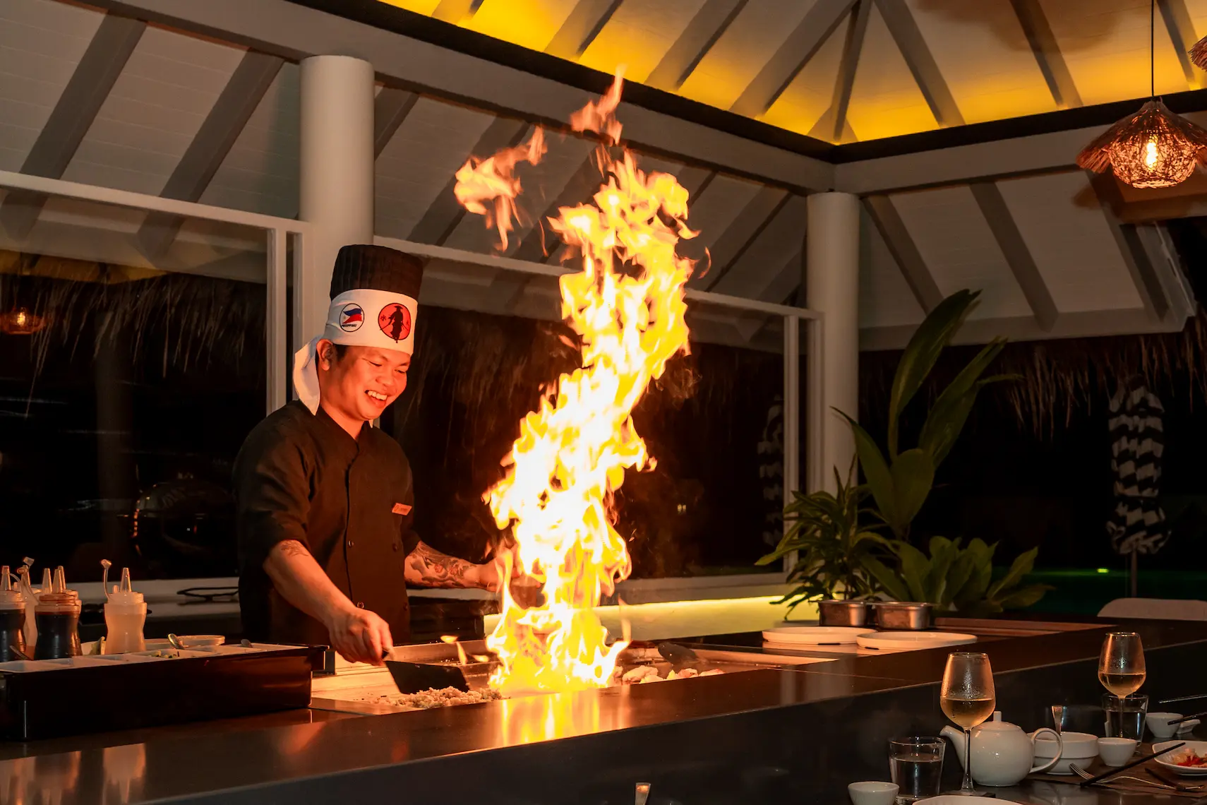 sun siyam iru veli maldives teppanyaki showcasing an interactive live cooking dining experience with refined island ambience