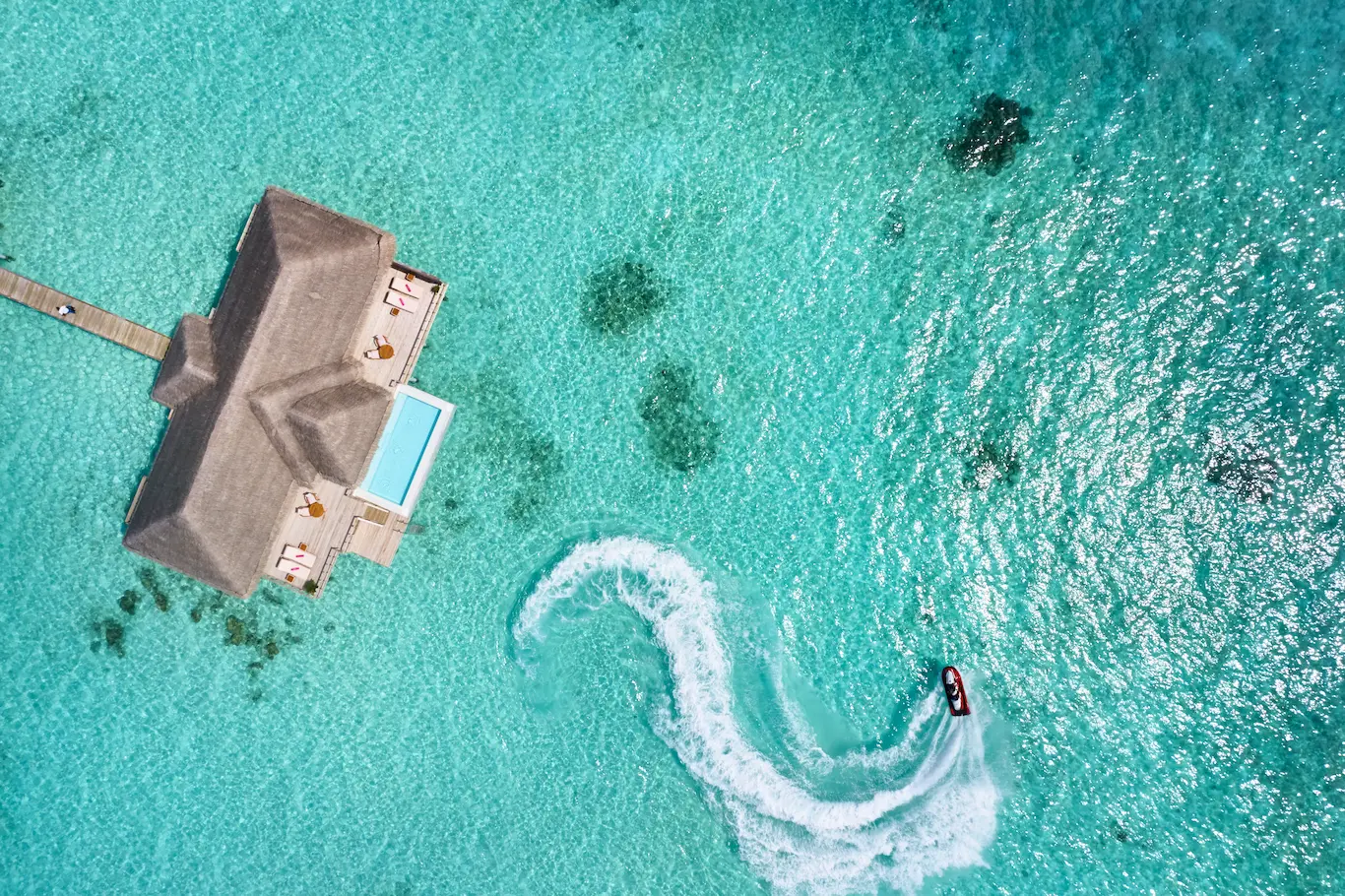 sun siyam iru veli maldives two bedroom ocean residence with pool aerial view showcasing the overwater setting