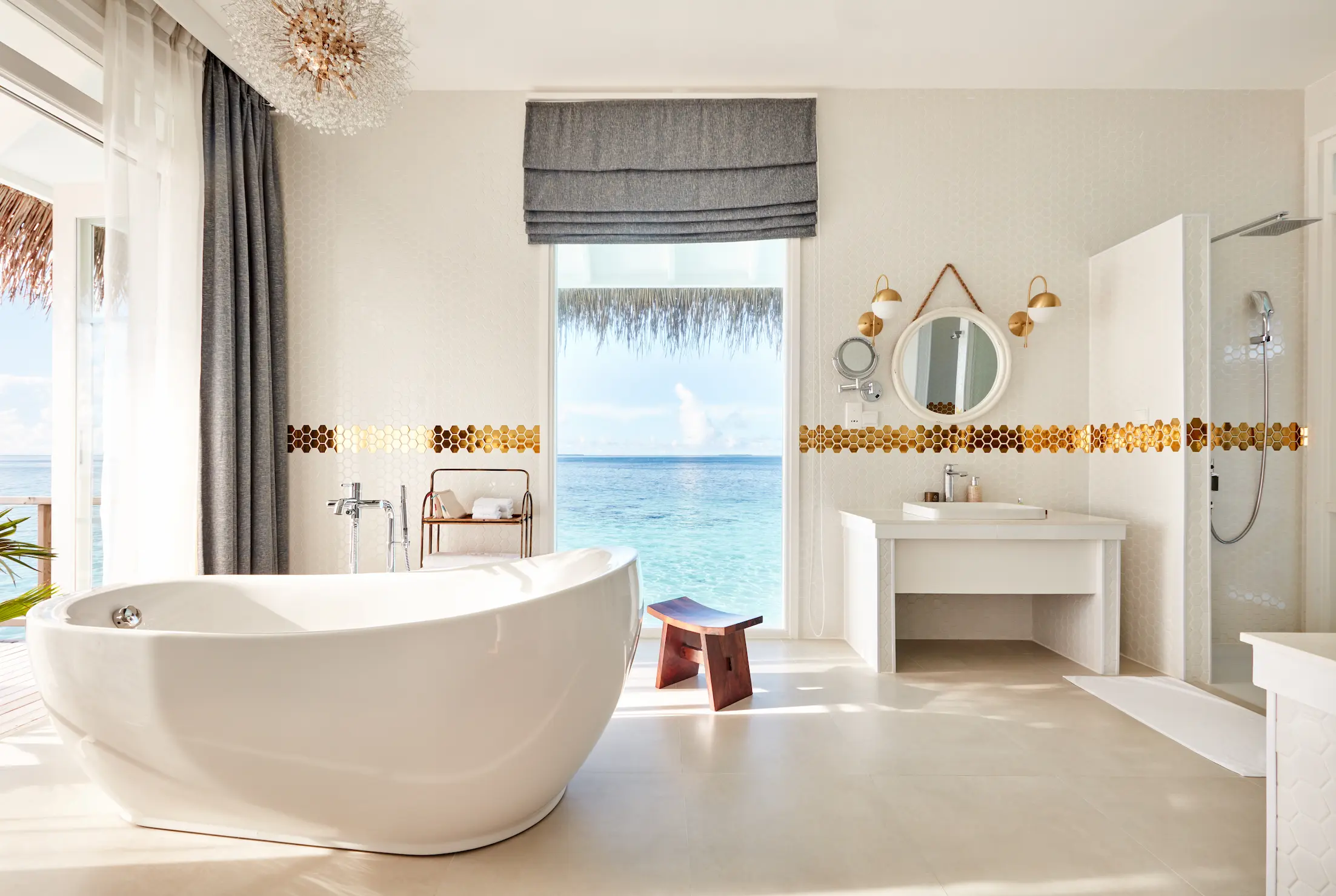 sun siyam iru veli maldives two bedroom ocean residence with pool bathroom featuring refined finishes and a tranquil overwater atmosphere