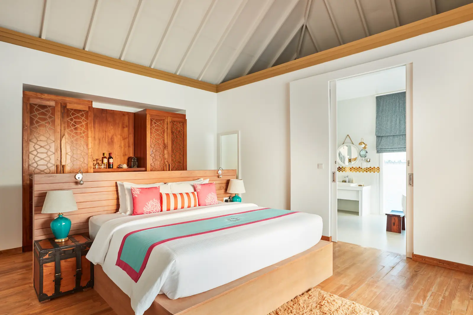 sun siyam iru veli maldives two bedroom ocean residence with pool bed detail highlighting elegant linen styling and tranquil overwater ambience