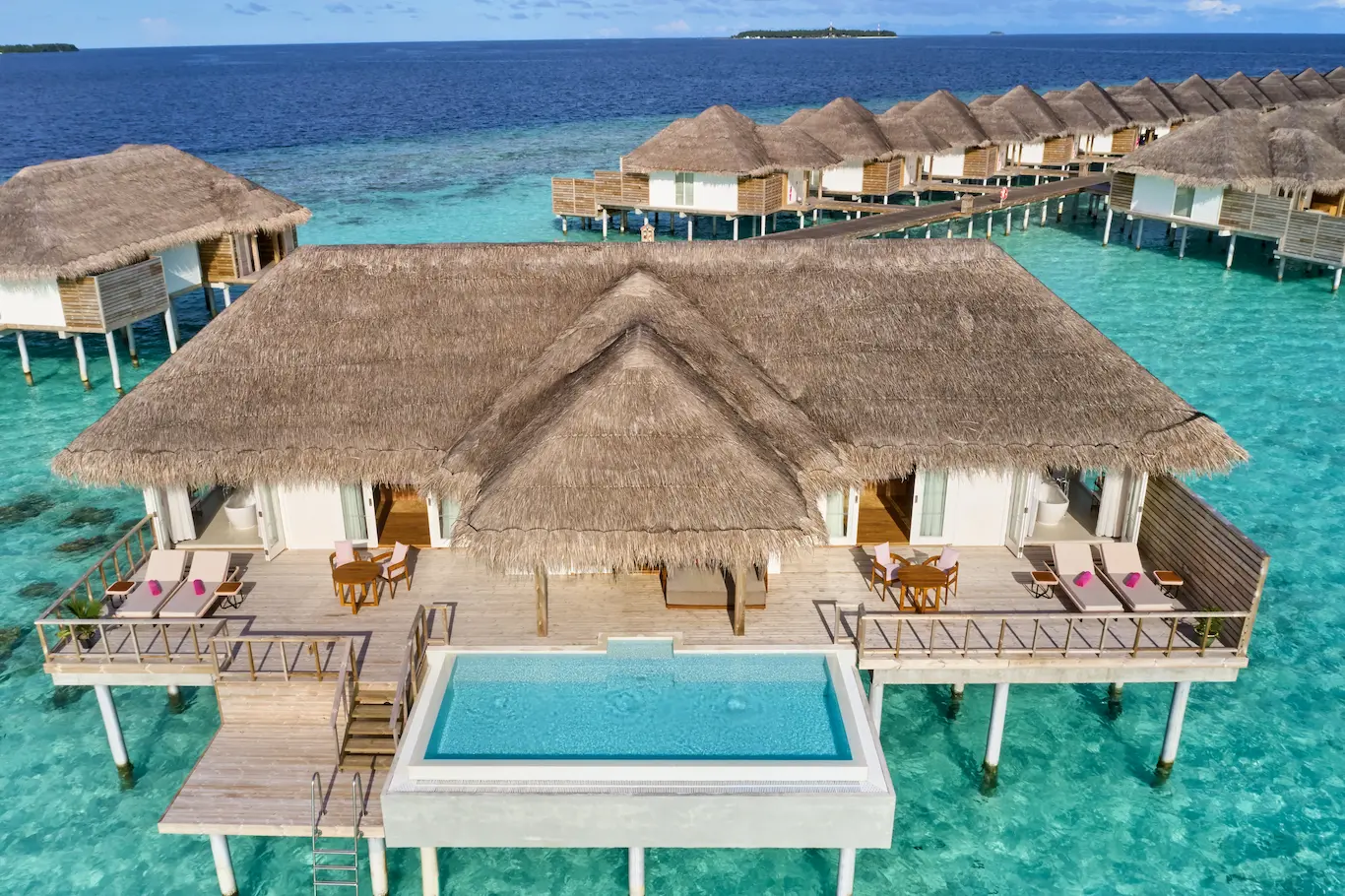 sun siyam iru veli maldives two bedroom ocean residence with pool exterior view showcasing its overwater architecture and ocean surroundings