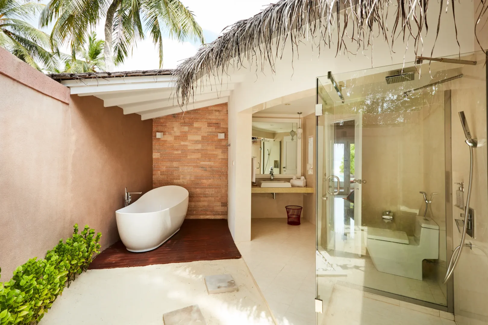 sun siyam vilu reef maldives beach villa with pool bathroom featuring elegant finishes and a serene tropical atmosphere