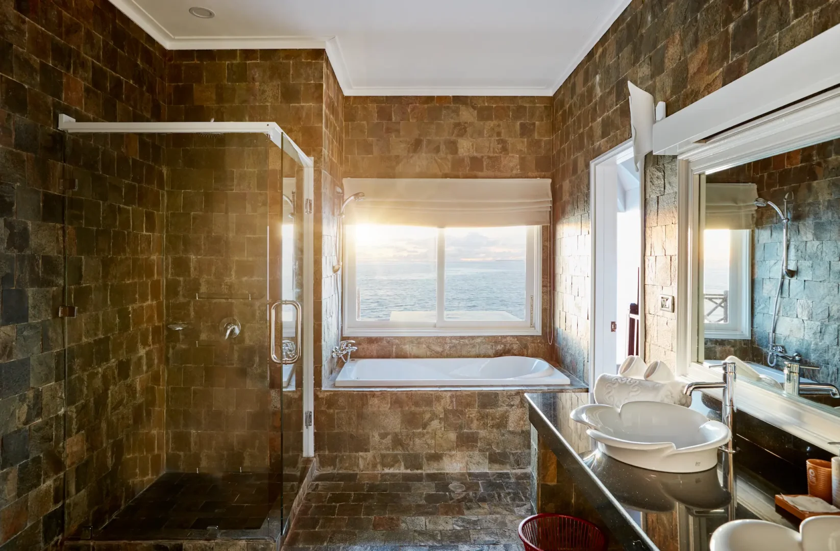 sun siyam vilu reef maldives grand water villa with pool bathroom featuring elegant finishes and a serene overwater atmosphere