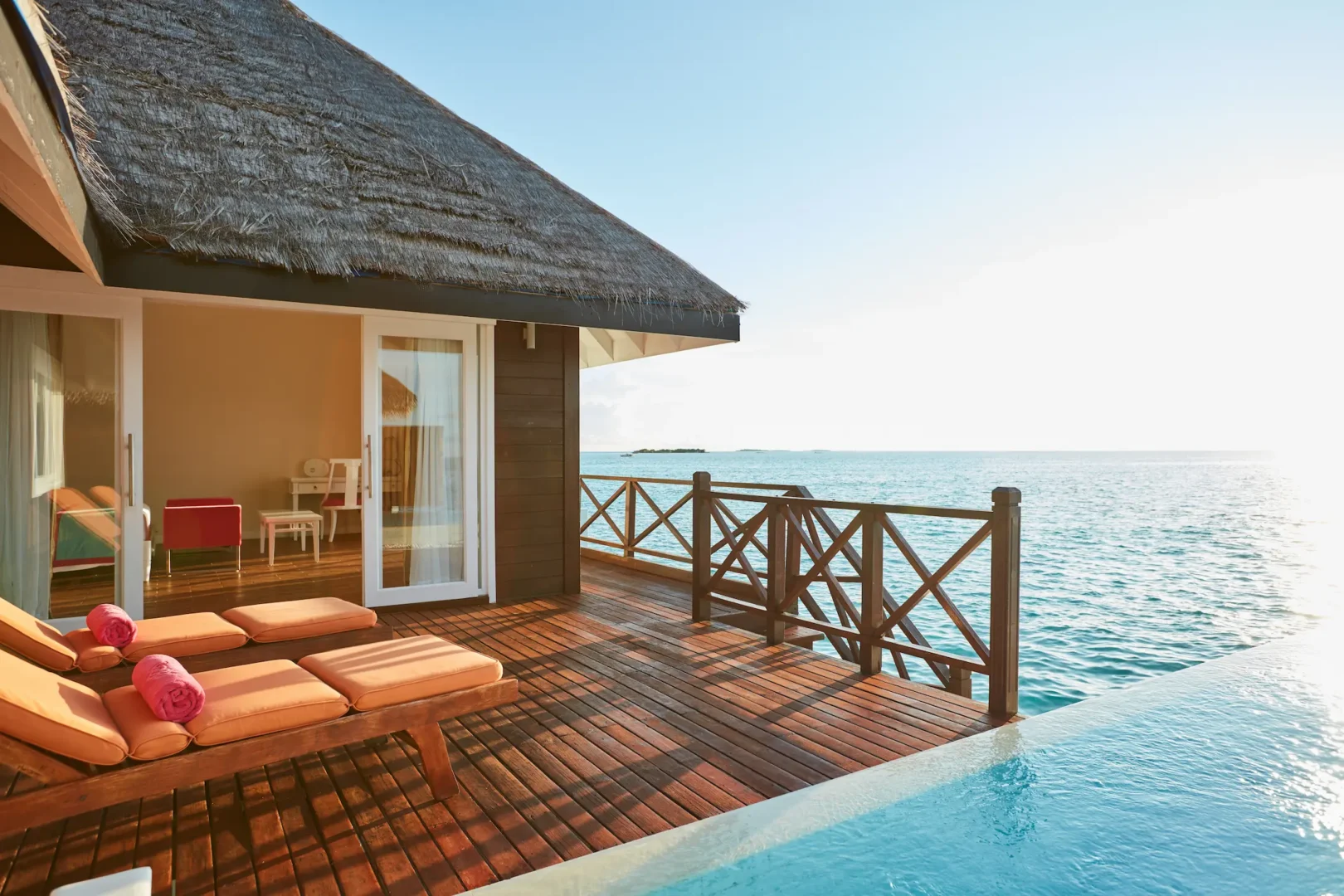 sun siyam vilu reef maldives grand water villa with pool terrace offering a spacious private overwater outdoor area above the turquoise lagoon