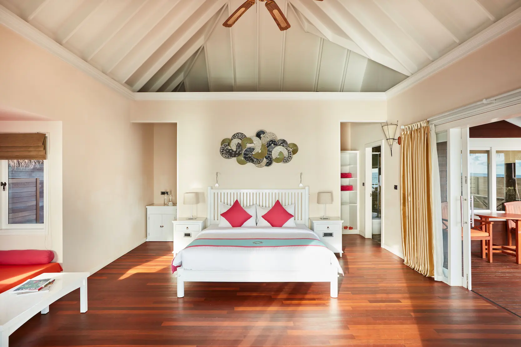 sun siyam vilu reef maldives reef villa bedroom featuring refined interiors natural light and a calm tropical ambience