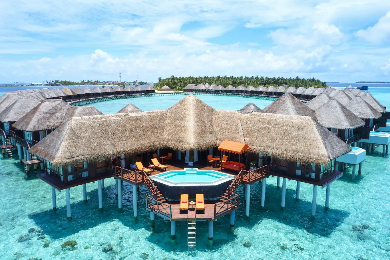 sun siyam vilu reef maldives two bedroom water villa with pool exterior set above the turquoise lagoon with expansive overwater views