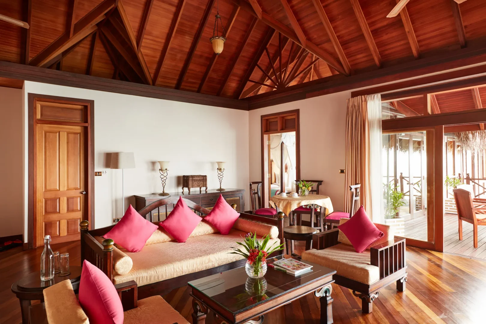 sun siyam vilu reef maldives two bedroom water villa with pool living area featuring spacious interiors refined furnishings and calm overwater surroundings