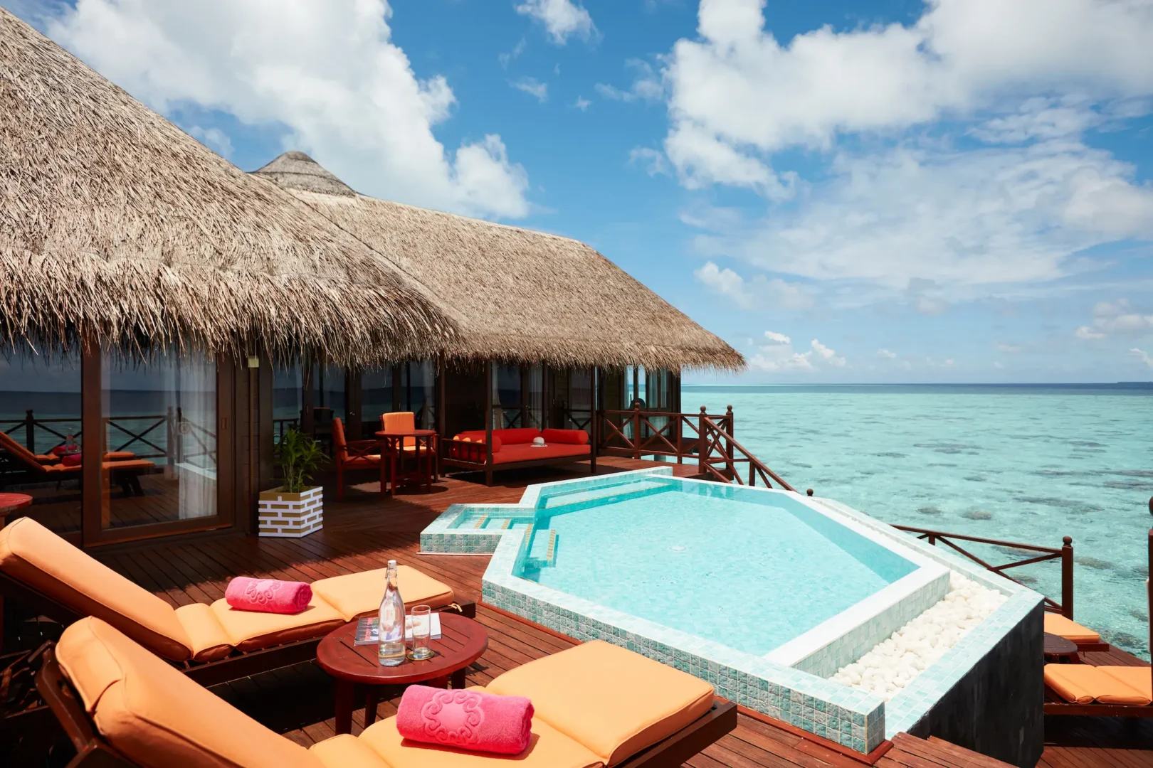 sun siyam vilu reef maldives two bedroom water villa with pool terrace offering a spacious private overwater outdoor area above the turquoise lagoon
