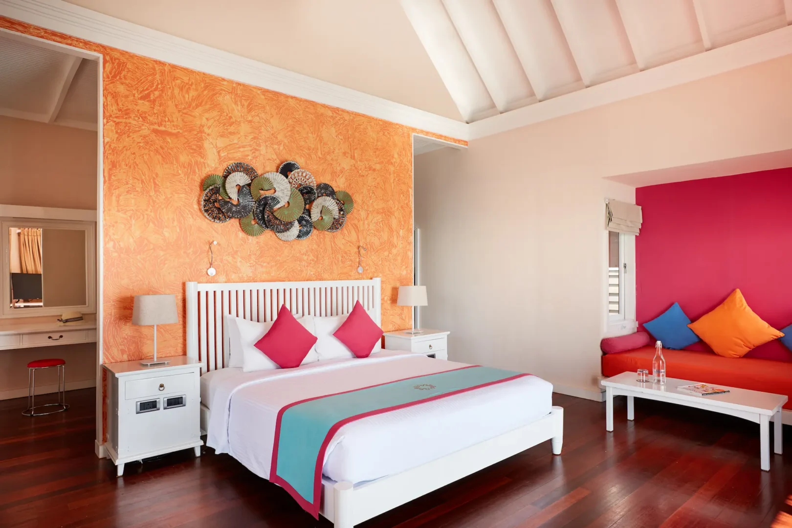 sun siyam vilu reef maldives water villa with pool bedroom featuring refined interiors soft natural light and tranquil overwater surroundings