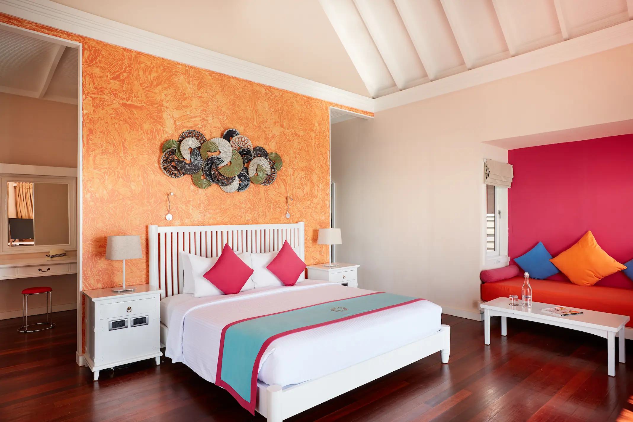 sun siyam vilu reef maldives water villa with pool bedroom featuring refined interiors soft natural light and tranquil overwater surroundings
