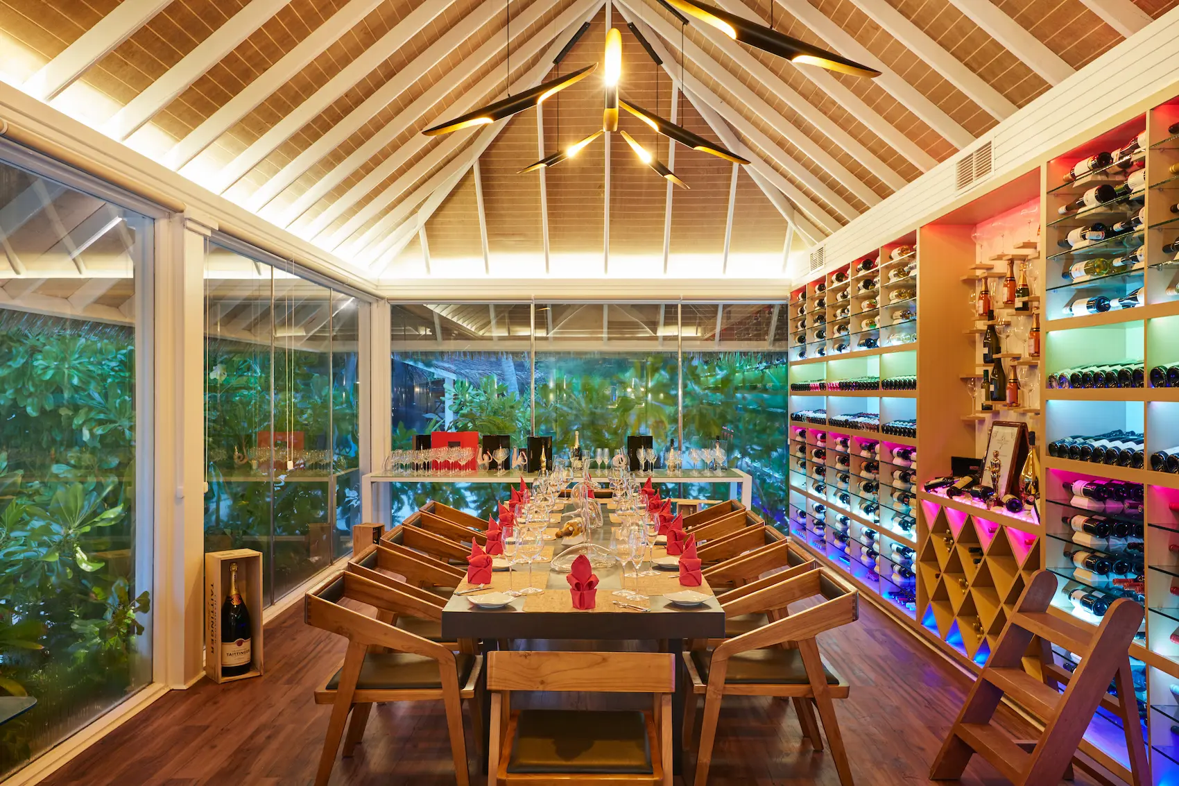 sun siyam vilu reef maldives wine cellar showcasing an intimate climate controlled space for curated fine wine selections