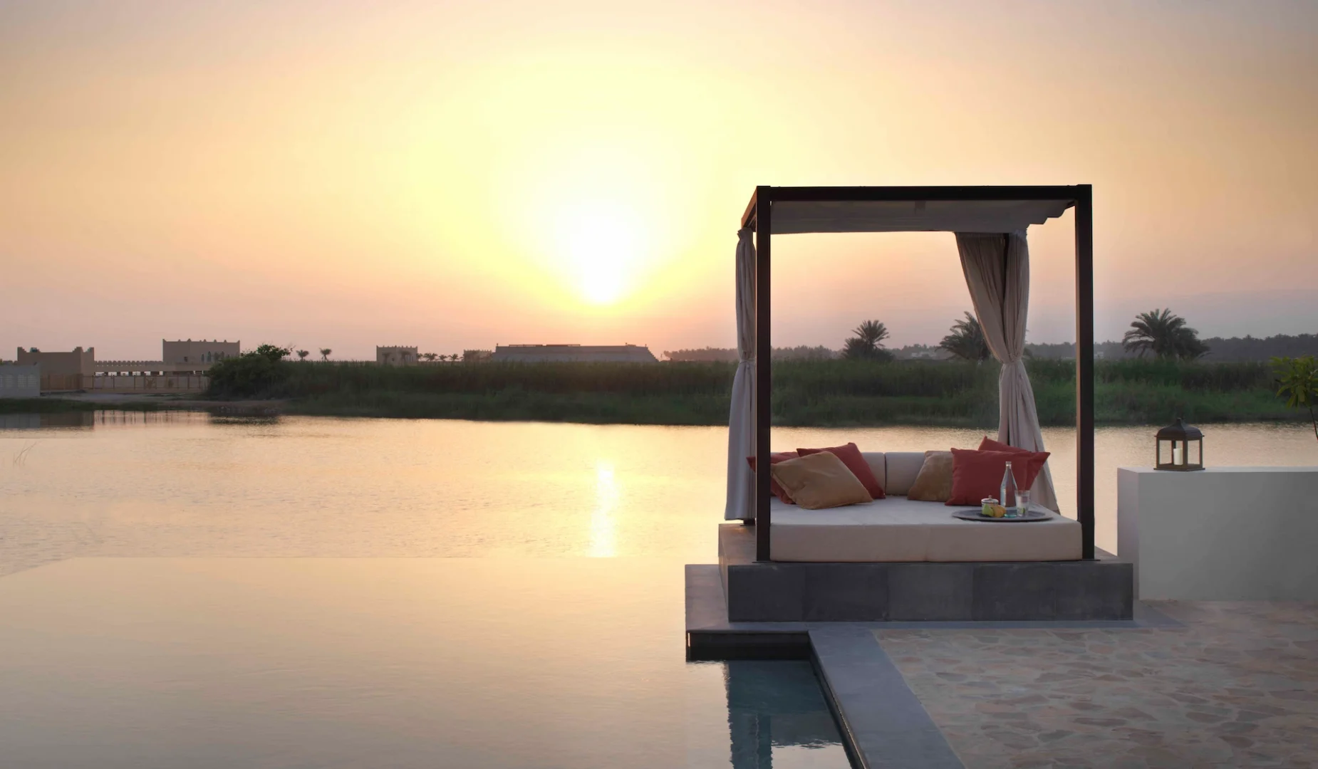 sunset over two bedroom garden view pool villa at al baleed resort salalah by anantara oman