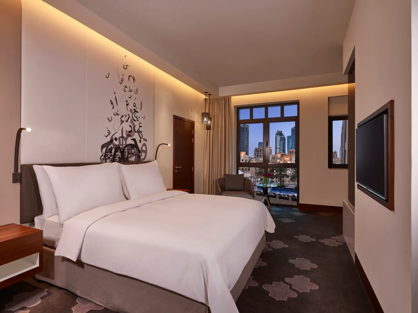 deluxe guest room king pool view at the heritage hotel dubai
