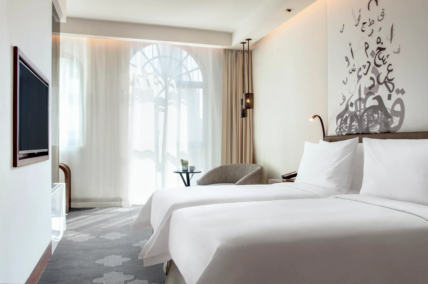 deluxe guest room twin city bed at the heritage hotel dubai