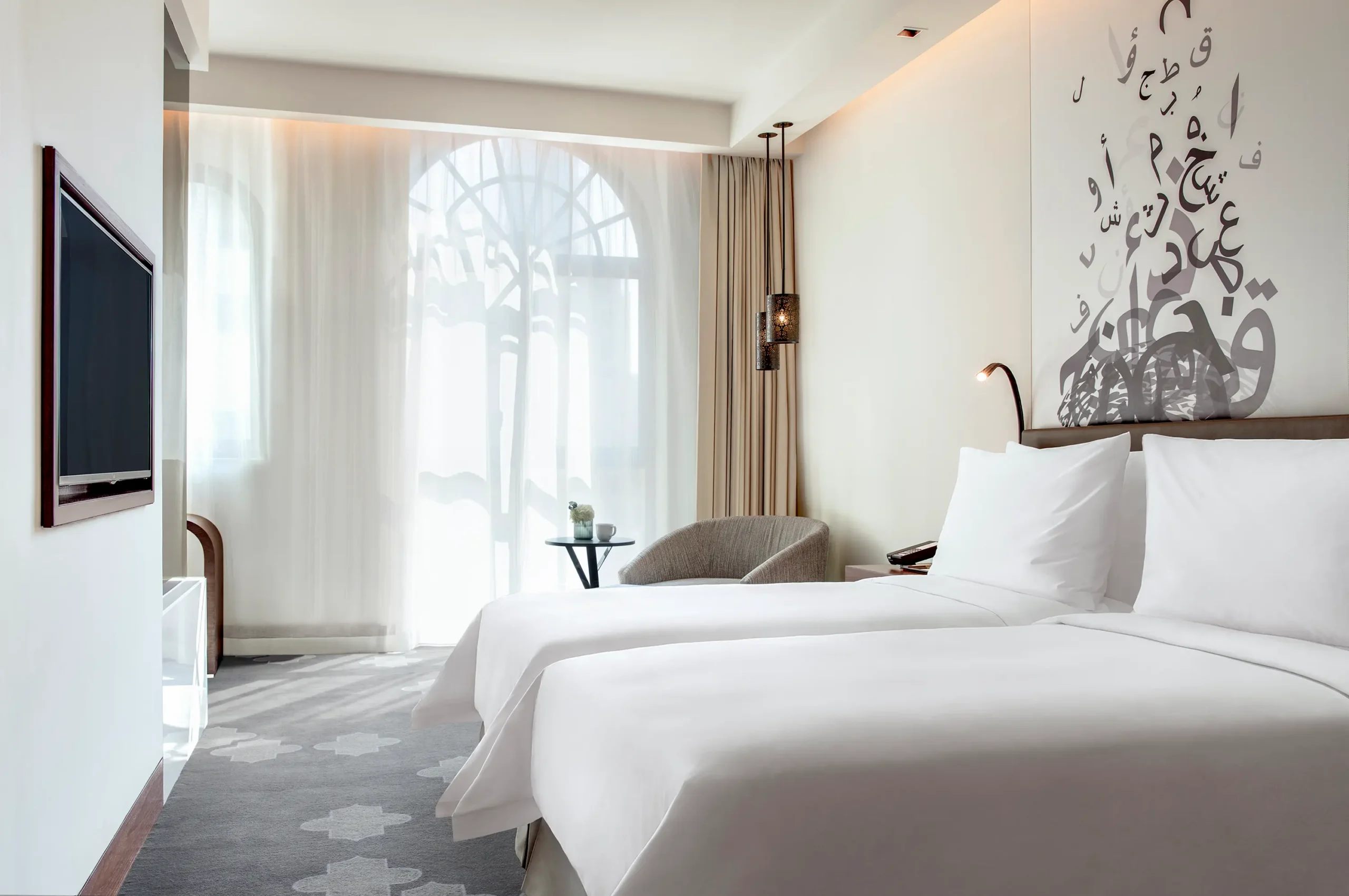 deluxe guest room twin city bed at the heritage hotel dubai