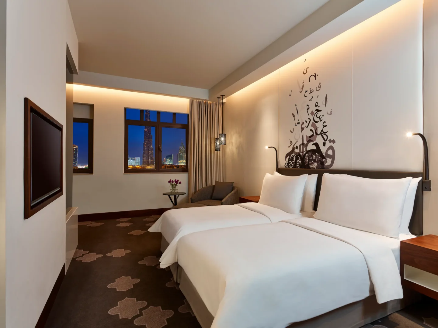 deluxe landmark view twin at the heritage hotel dubai with night city views