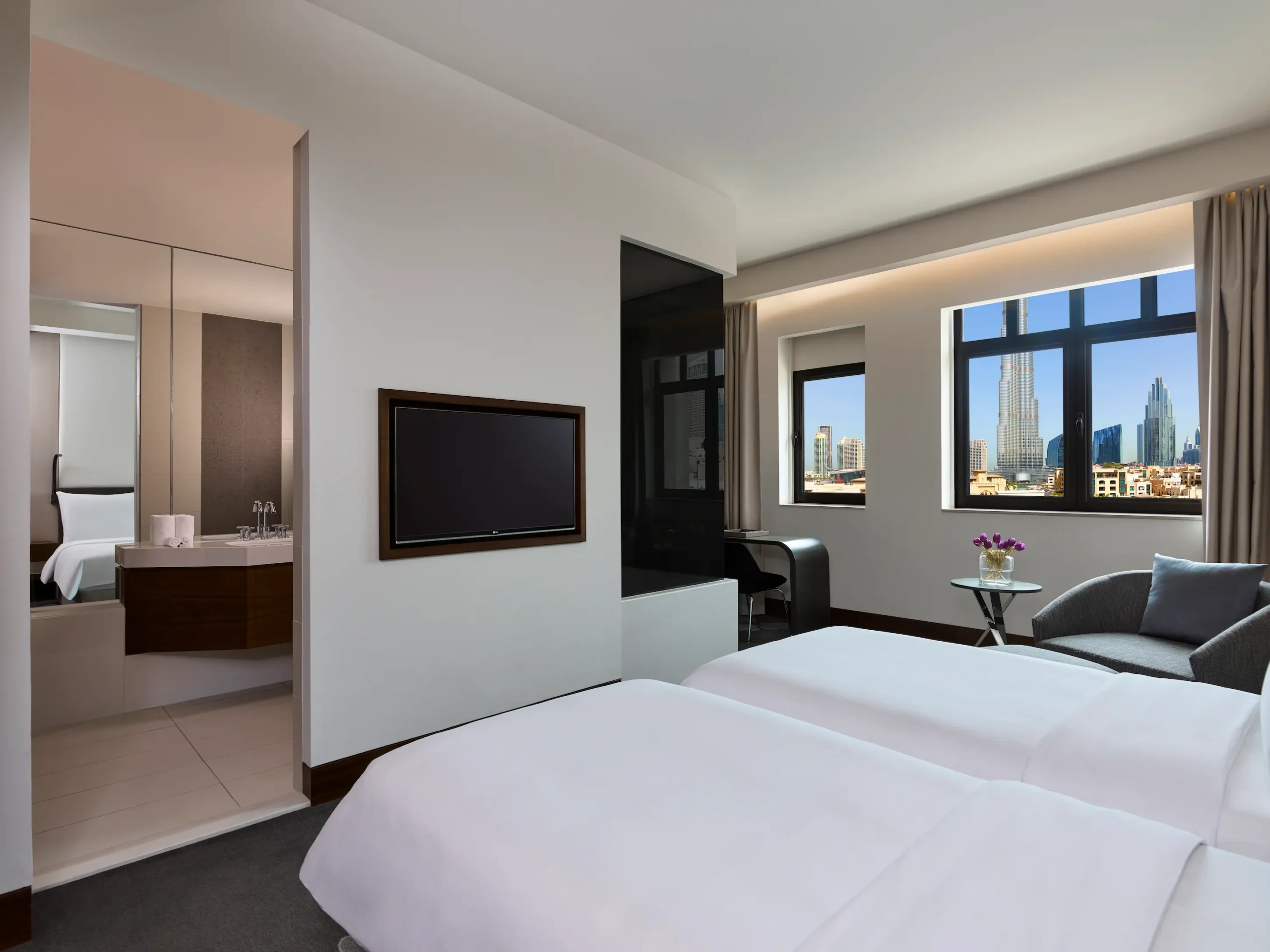 deluxe landmark view twin at the heritage hotel dubai with in room tv amenities