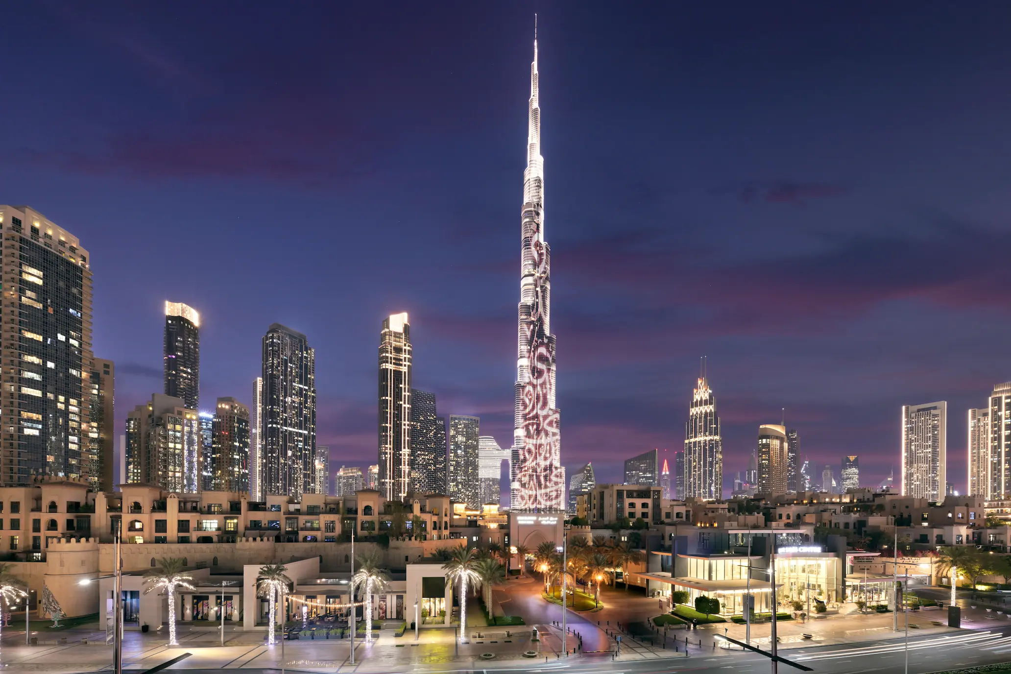 dubai skyline at night near the heritage hotel dubai