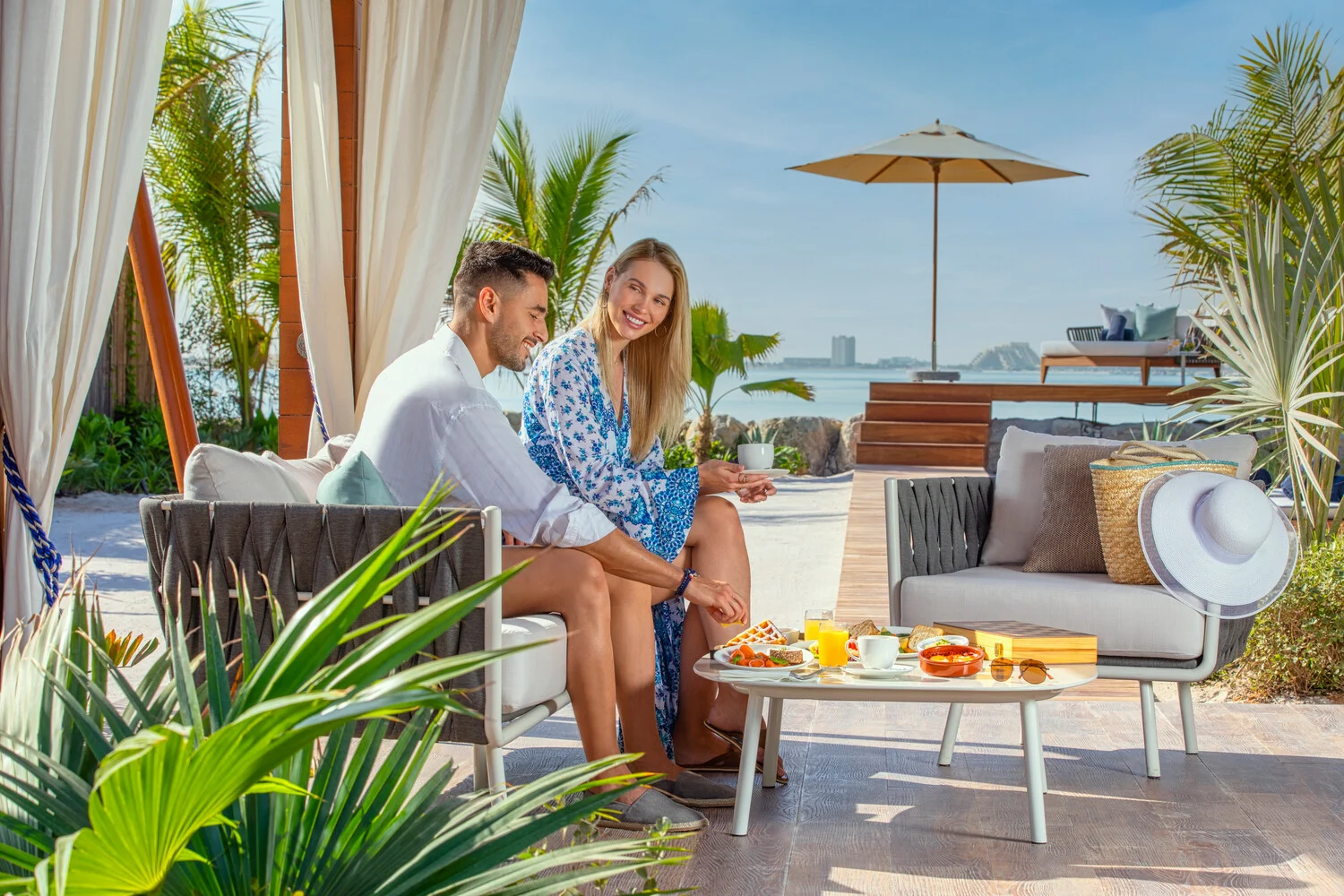 the ritzcarlton al hamra beach lifestyle capturing relaxed beachfront moments and signature coastal living experiences