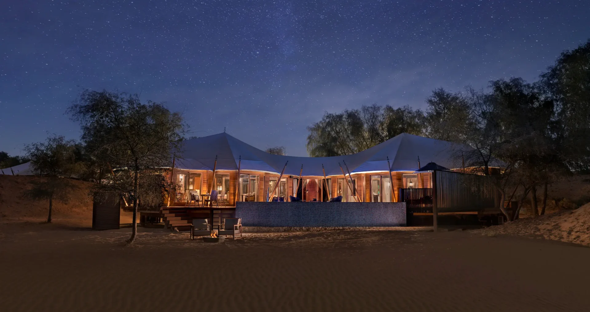 the ritzcarlton al wadi desert al khaimah villa exterior set within the natural desert landscape