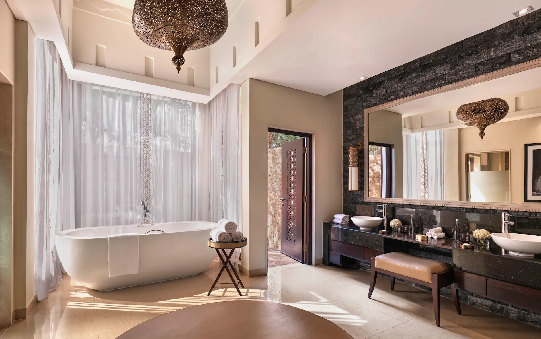 the ritzcarlton al wadi desert al rimal enclosed bathroom with a refined indoor bathing space designed for privacy and comfort