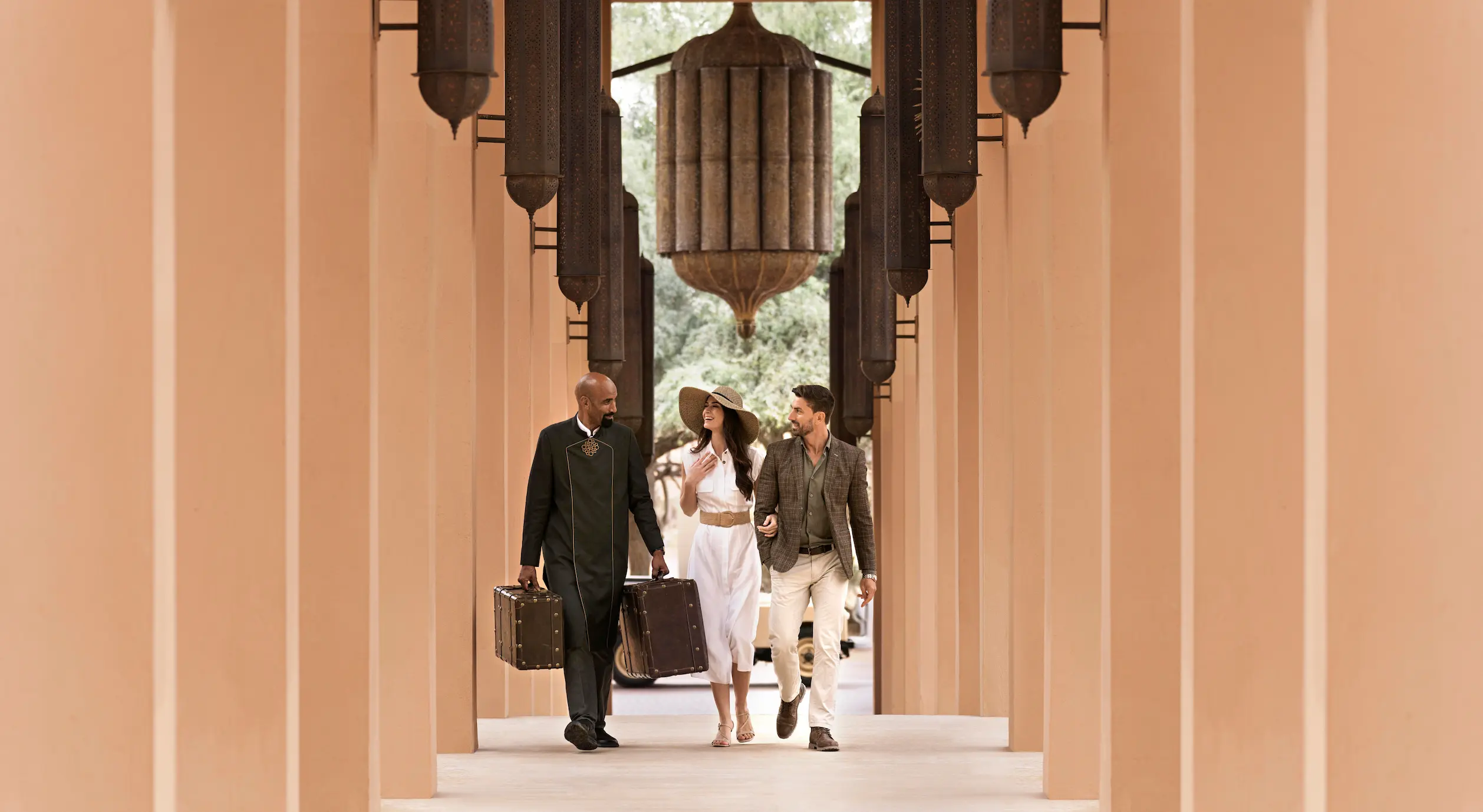 the ritzcarlton al wadi desert arrival corridor concierge featuring a welcoming concierge area within an elegant arrival passage