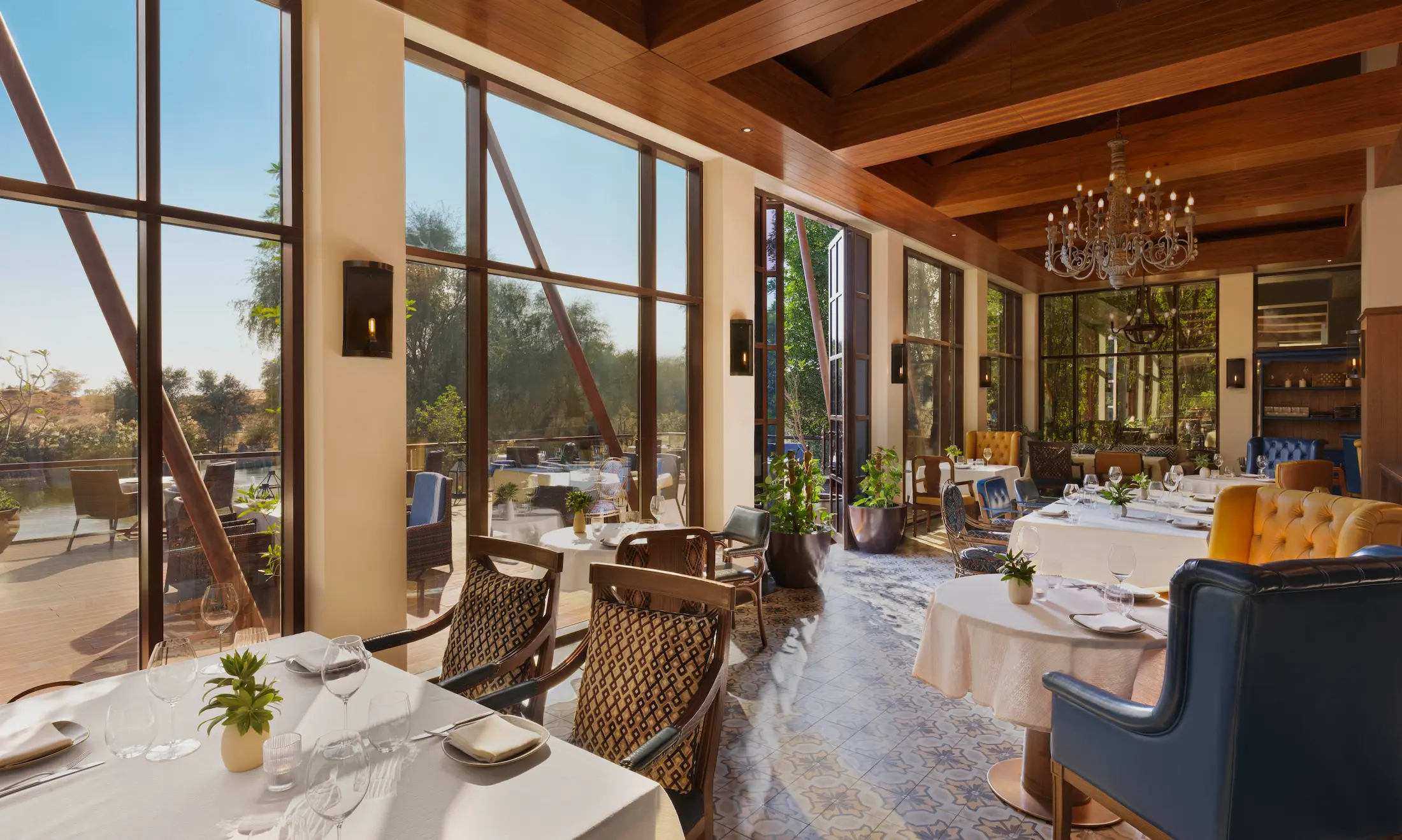 the ritzcarlton al wadi desert farmhouse by syrco showcasing a refined farm to table dining experience set within the desert