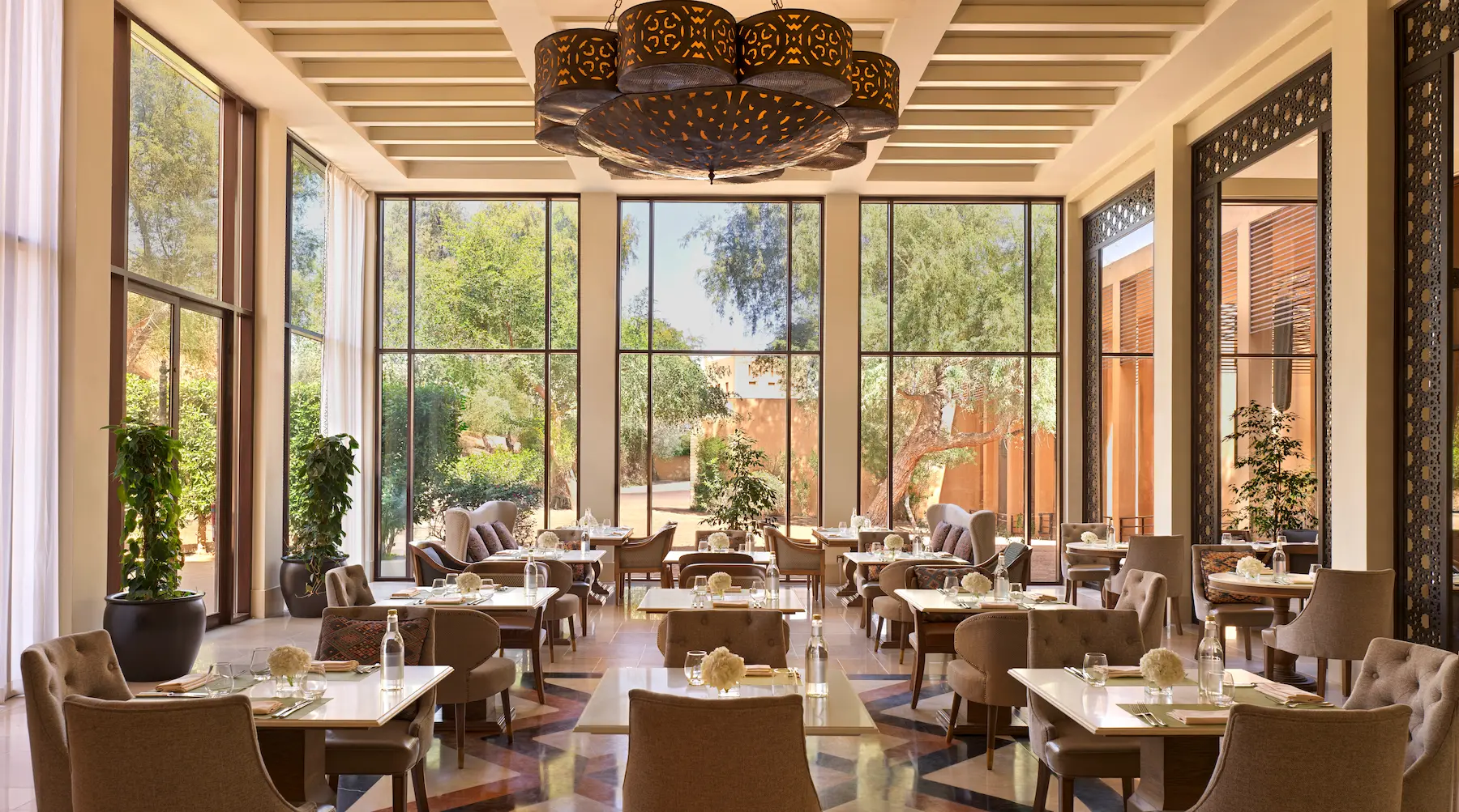 the ritzcarlton al wadi desert kaheela interior showcasing elegant dining interiors inspired by refined arabian design