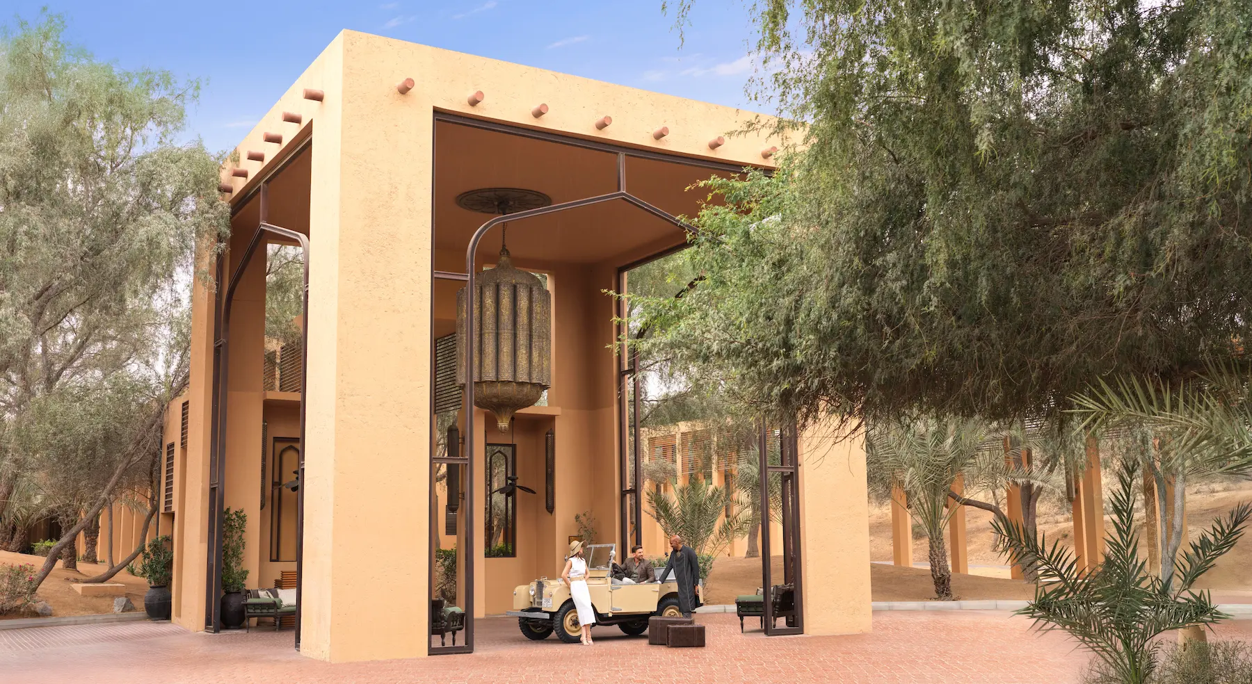 the ritzcarlton al wadi desert porte cochere featuring a grand covered arrival area designed for elegant guest drop off