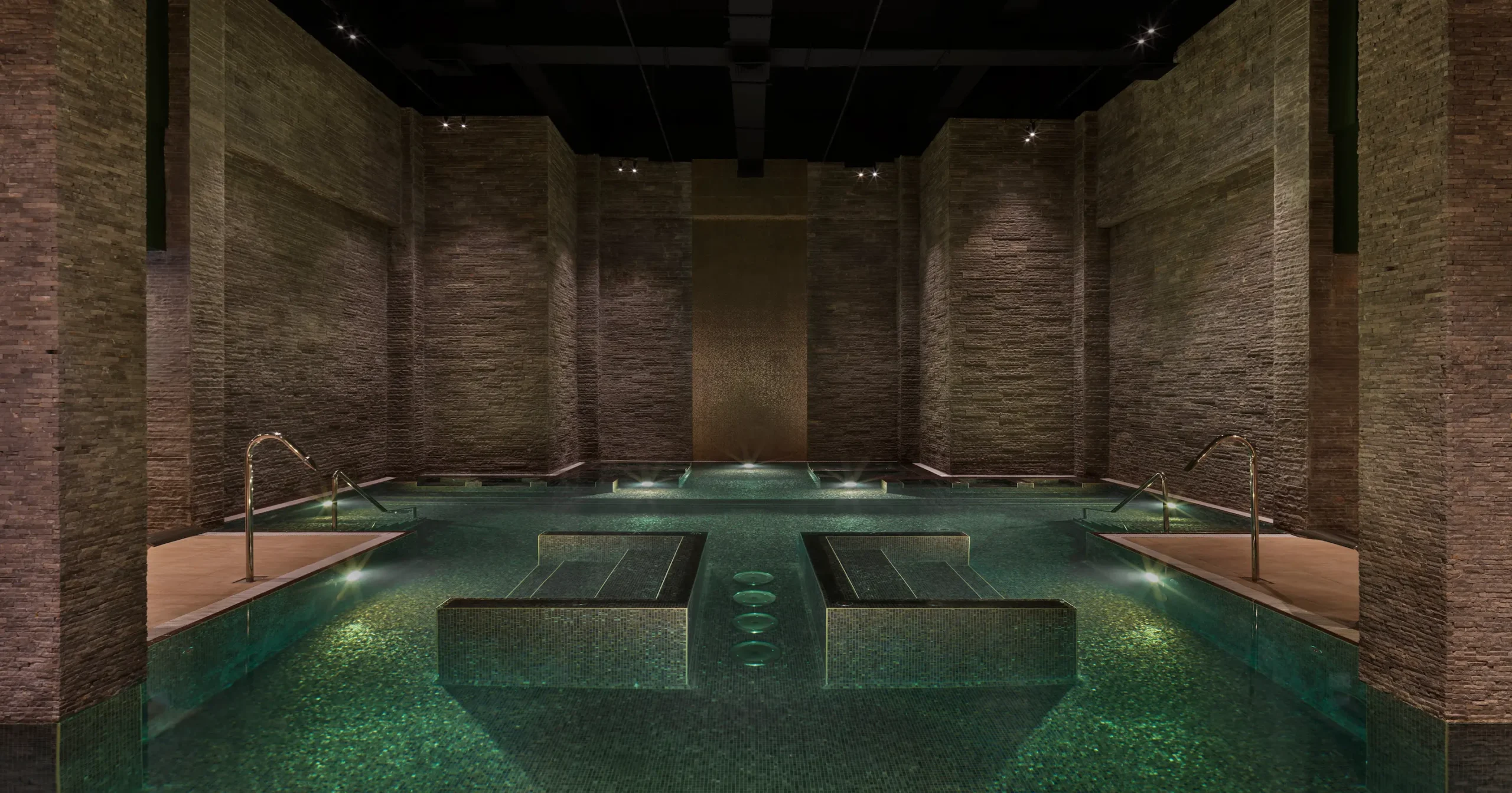 the ritzcarlton al wadi desert the rainforest vitality pool offering a serene hydrotherapy pool designed for relaxation and renewal