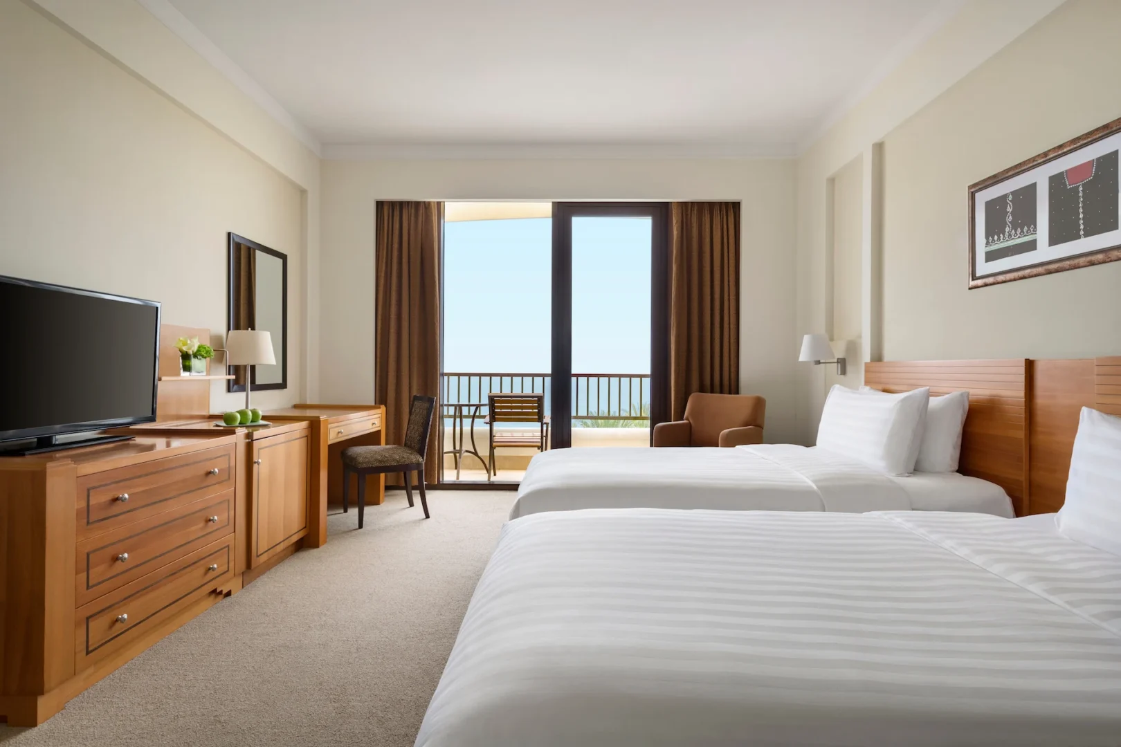 twin bedroom in guest room sea view hilton muscat al wana oman